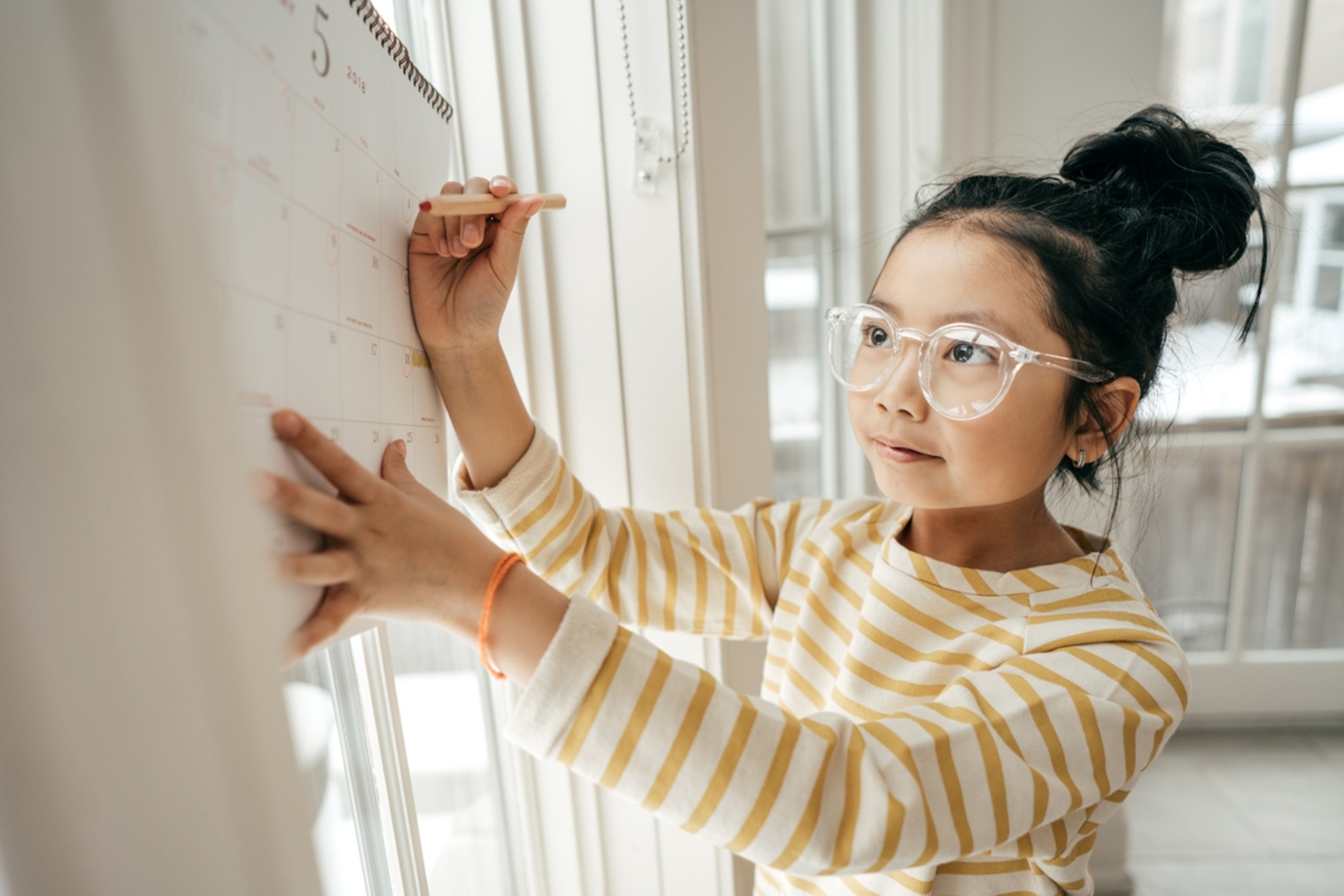 Girl with calendar.