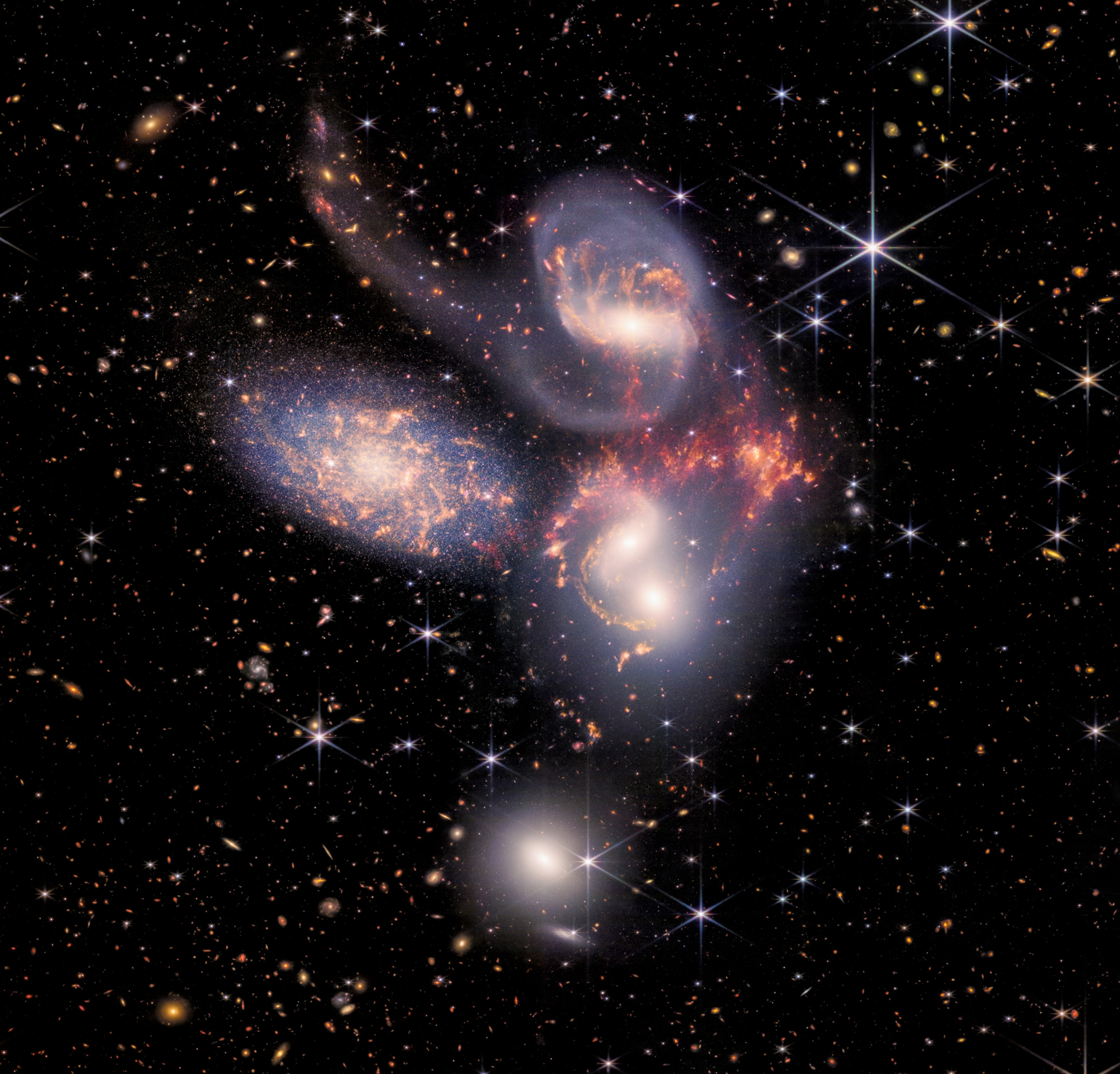 Five cloudy objects on starry sky.