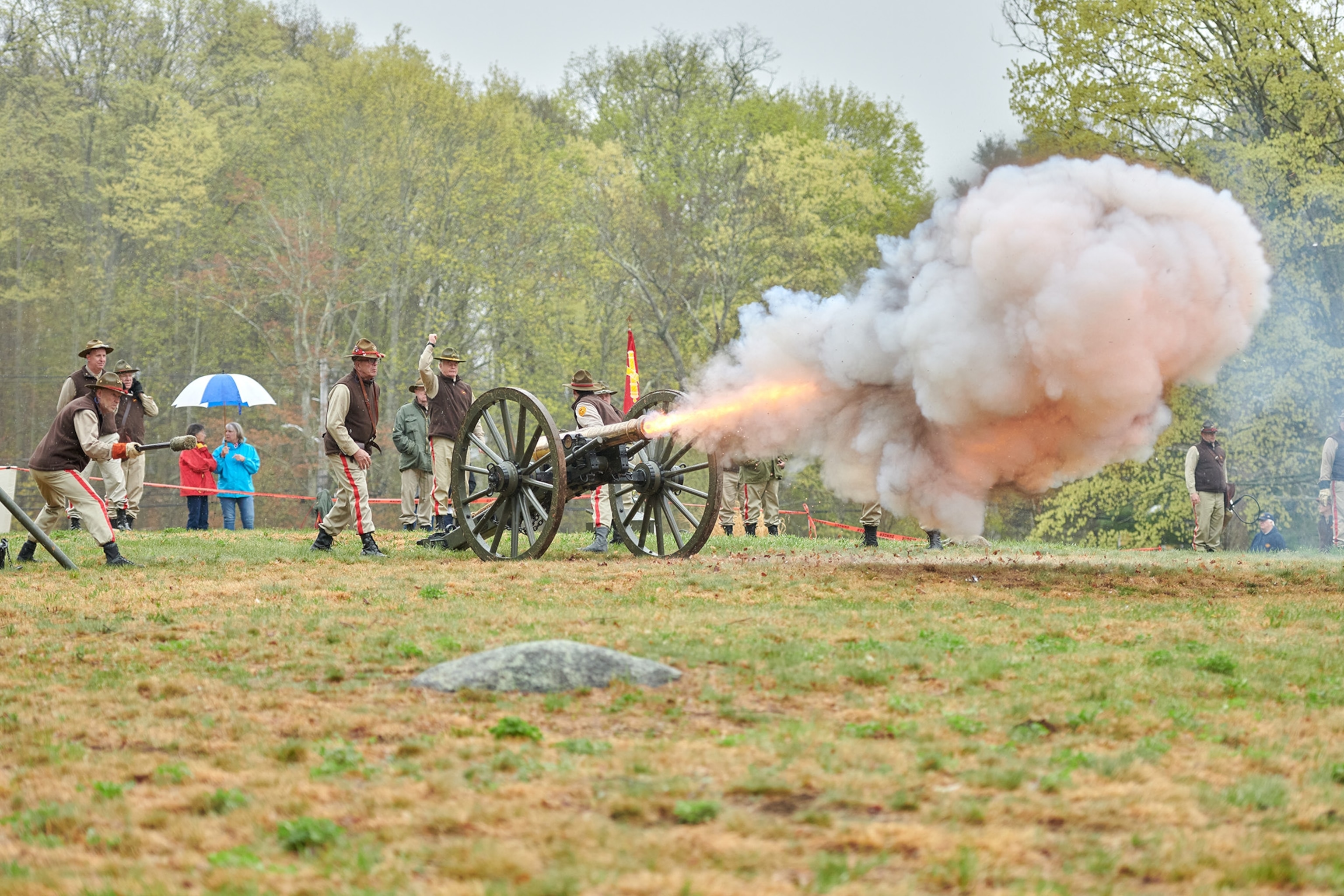 Canon being fired from a tradition wheeled cart
