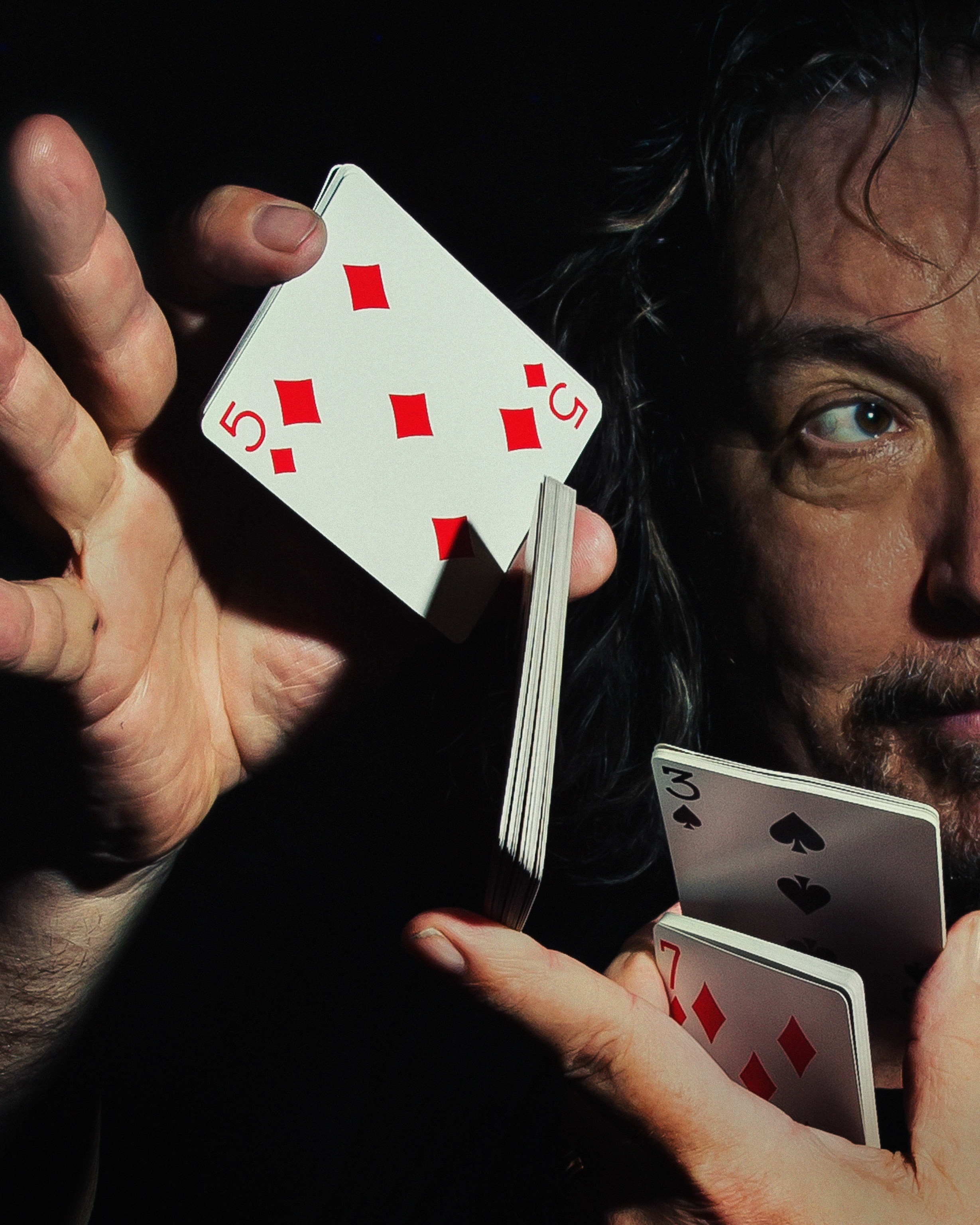 A magician does a card trick