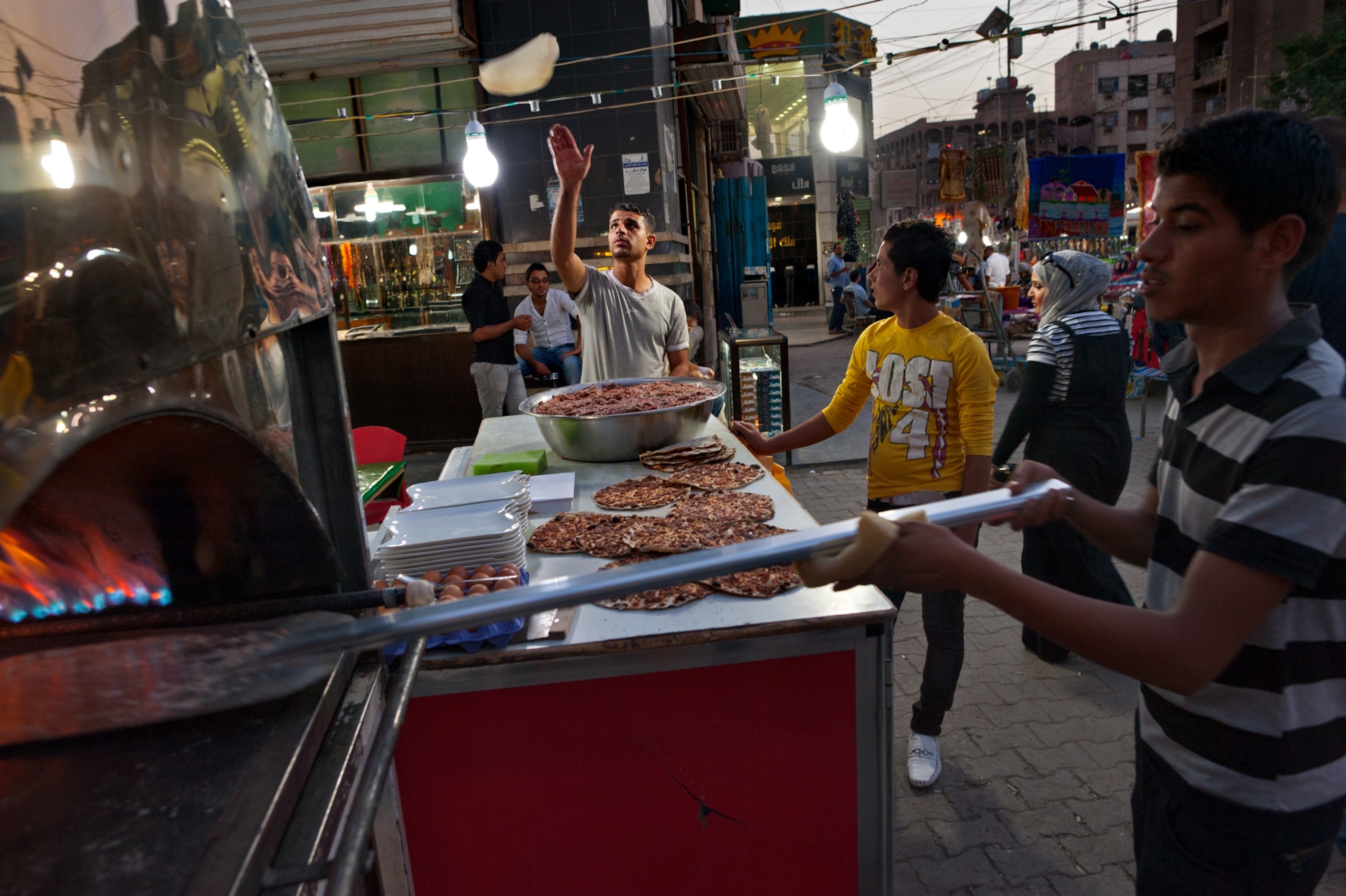 a pizza vendor in central Baghdad's Al Karradah district