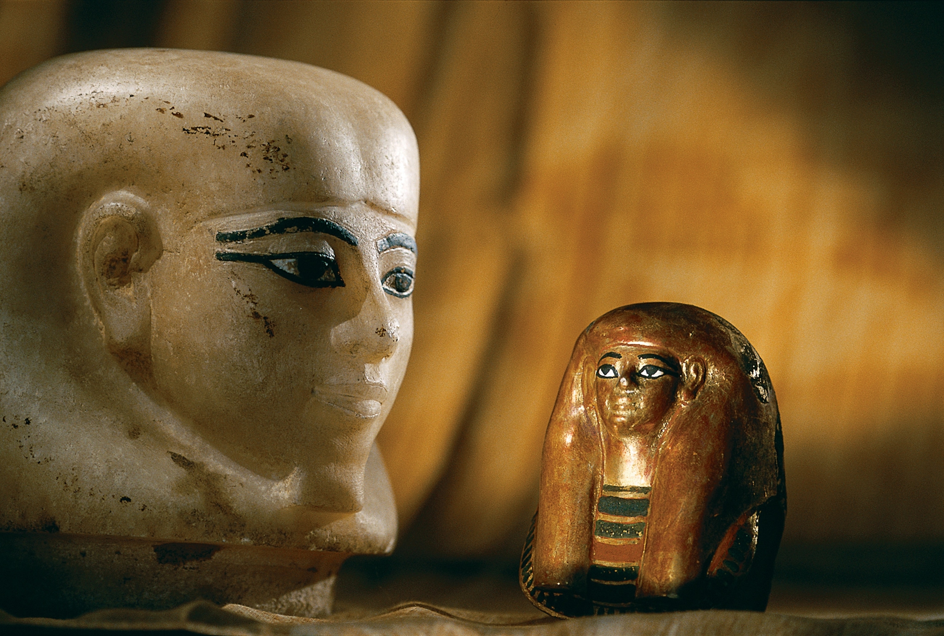 small mask for bundled viscera and a canopic jar stopper for Tjuya.