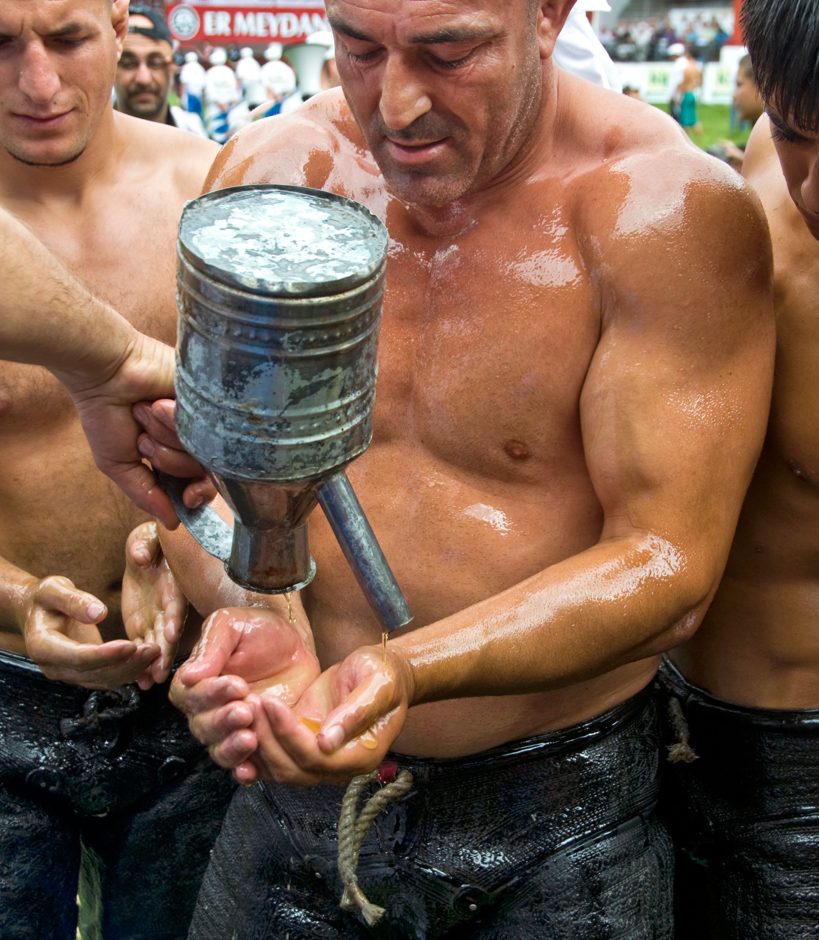 Wrestler getting oiled