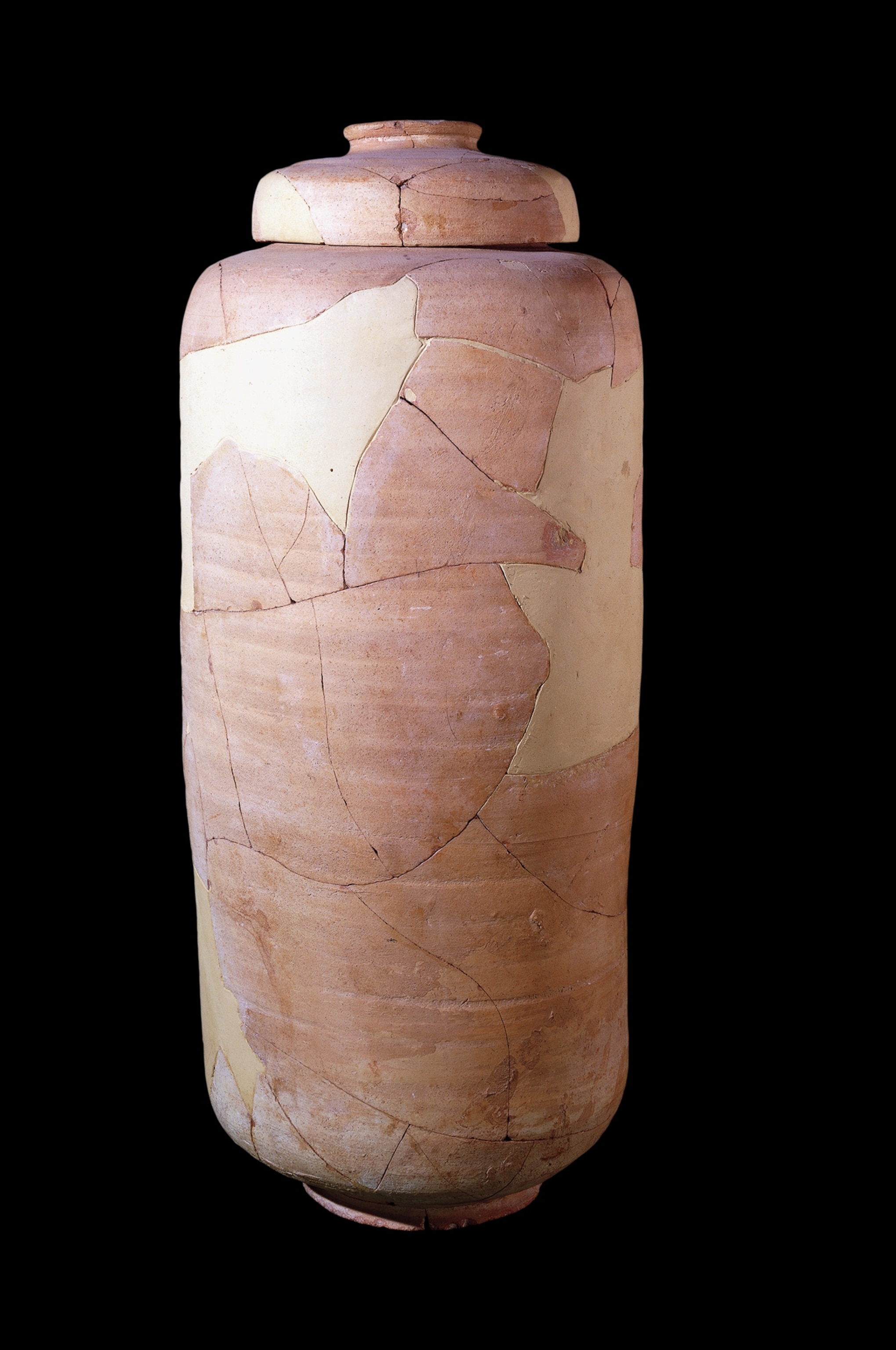 A restored pottery jar and lid of the type used to contain the Dead Sea Scrolls from Cave 1, where the first scrolls were found.
