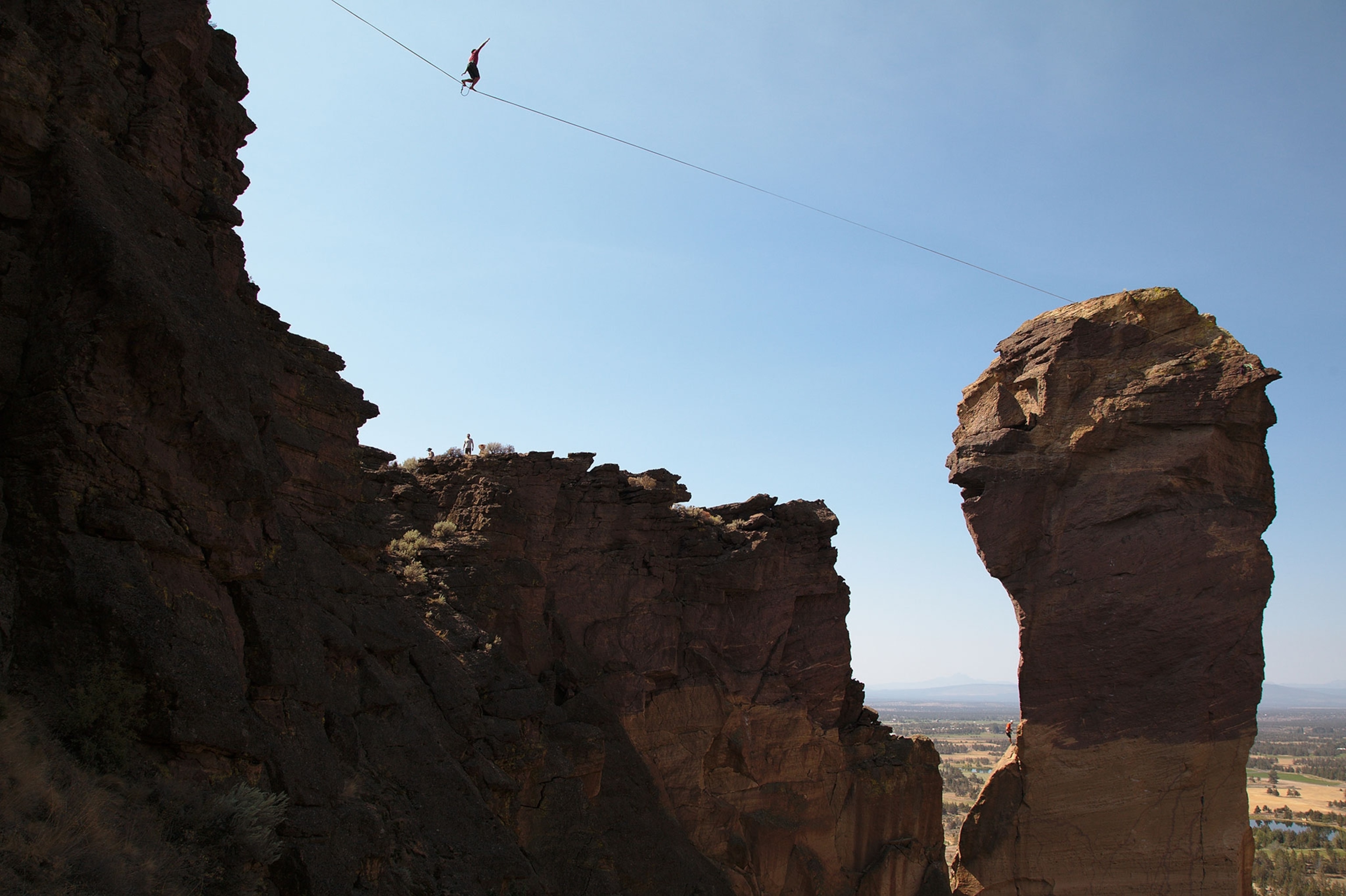 a slackliner in Smith Rock State Park, Oregon