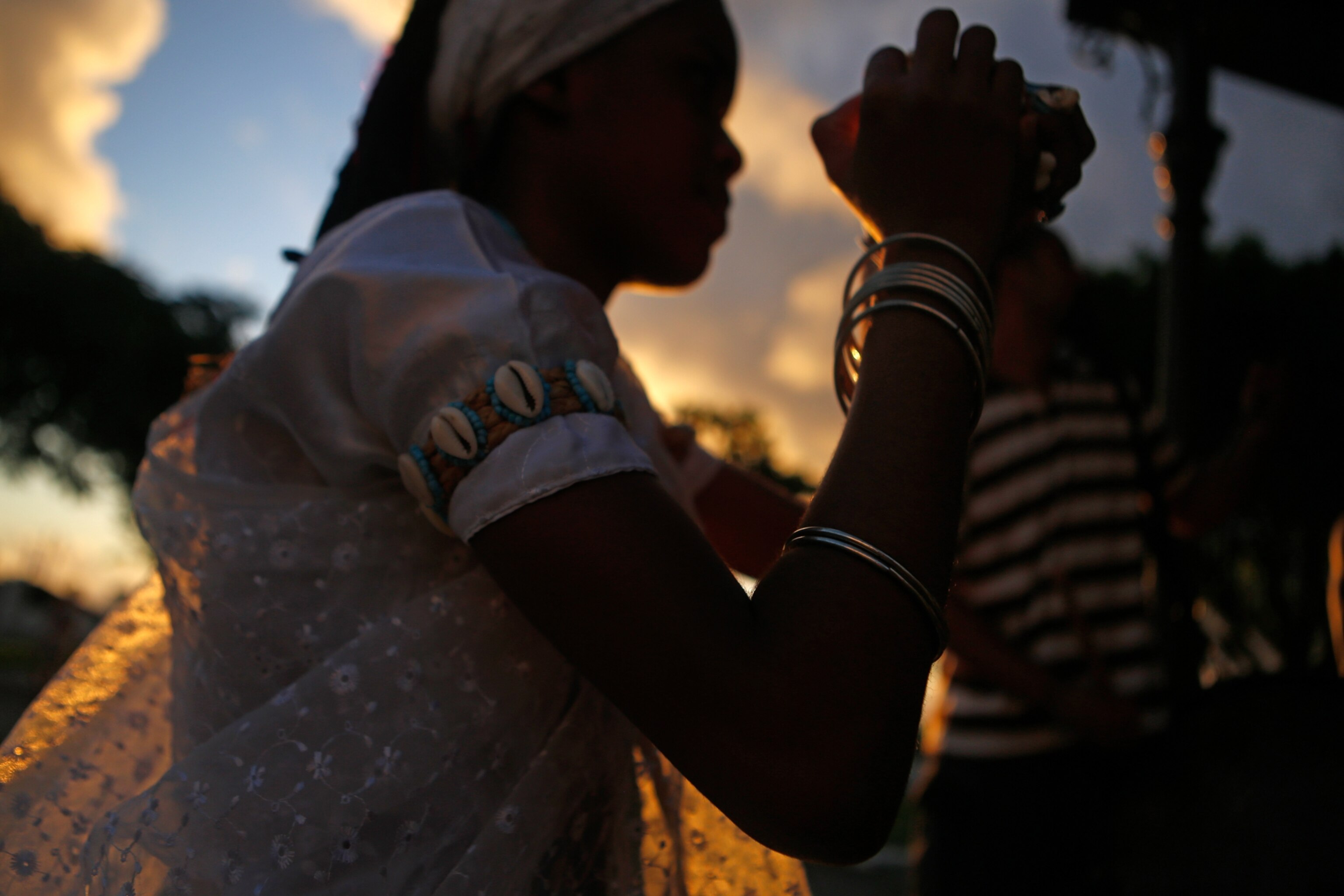 a woman in sunset