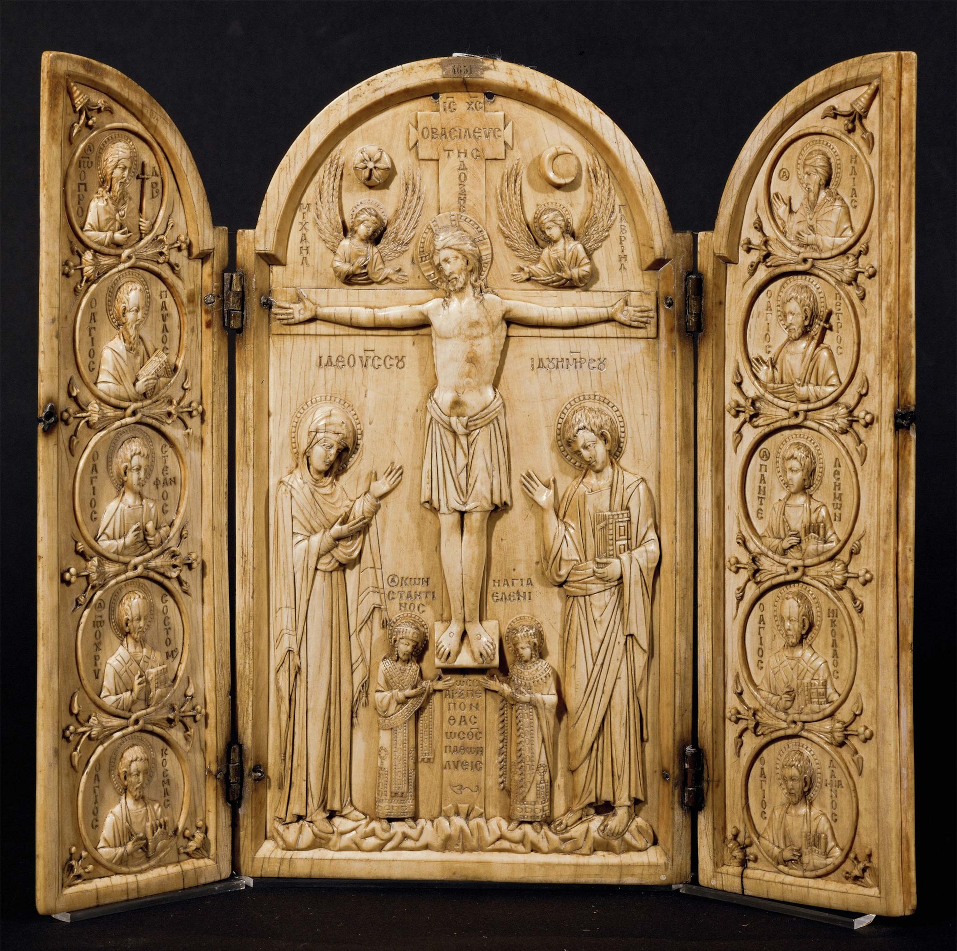 St. Helena and Emperor Constantine at the foot of the cross show in a sixth century carved ivory piece carved into ivory