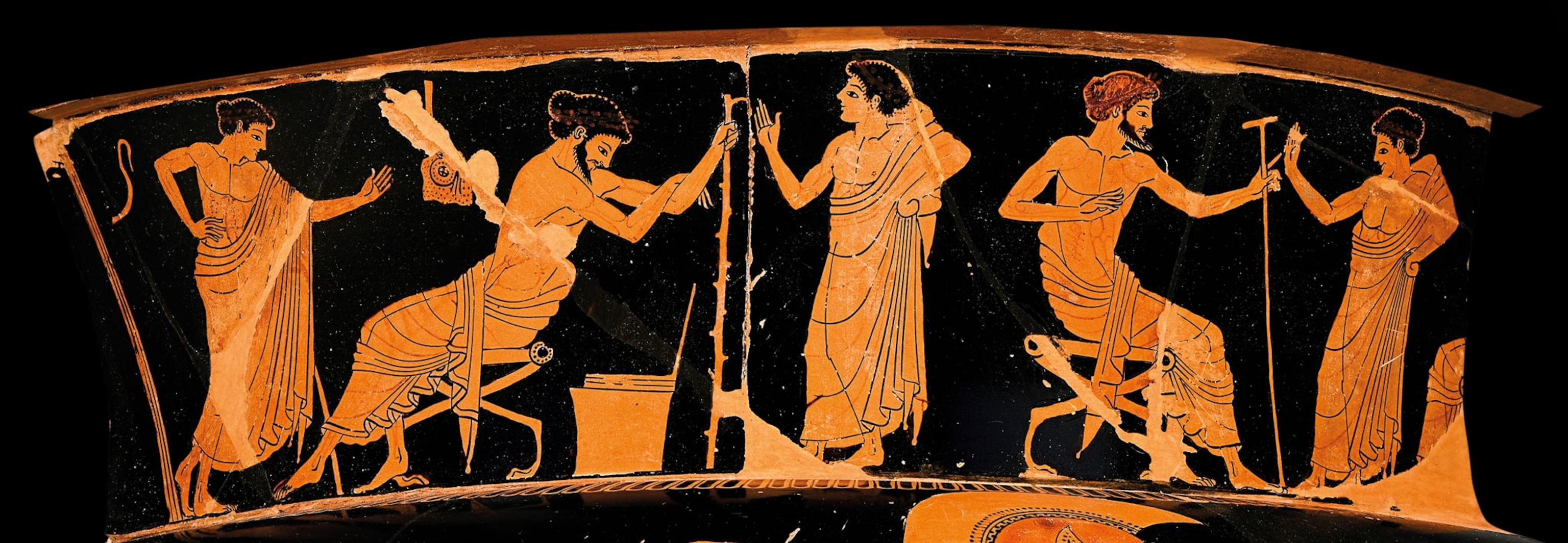 a fragment of a wine-mixing bowl showing a lesson in progress