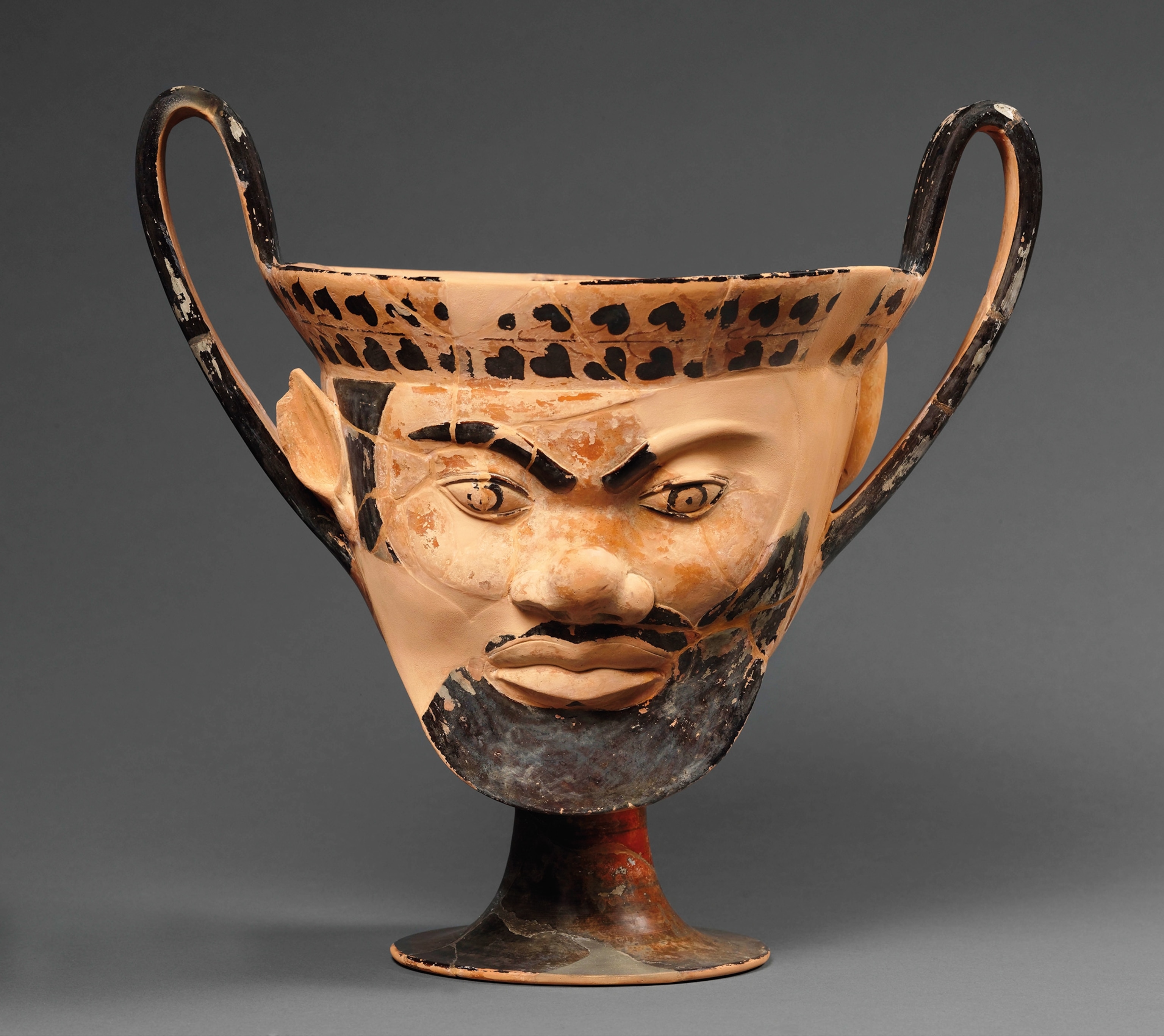 A loyal friend, tutor, and servant to Dionysus, Silenus was nearly always present in the deity’s entourage. His likeness appears on both sides of this kantharos from 540 B.C.