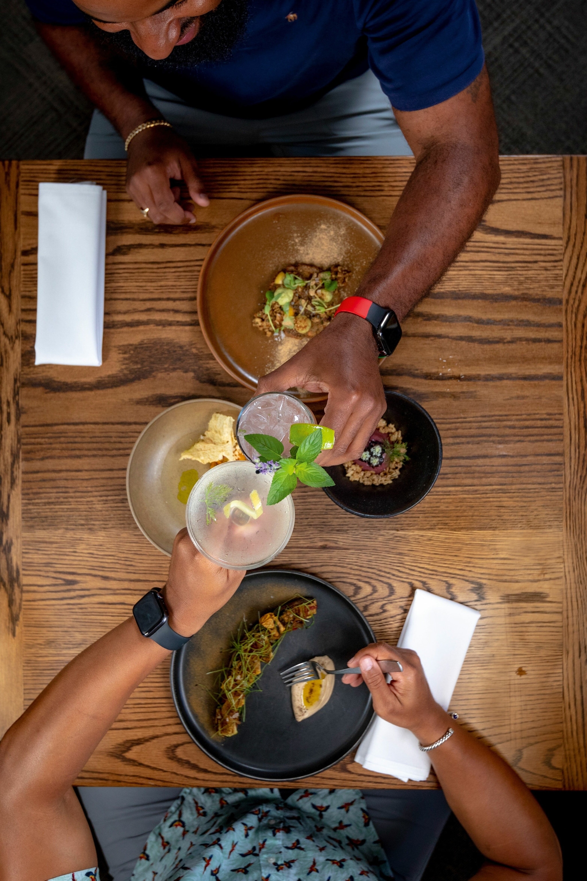 Guests toast with a ‘nojito‘ and sake martini at Dory.