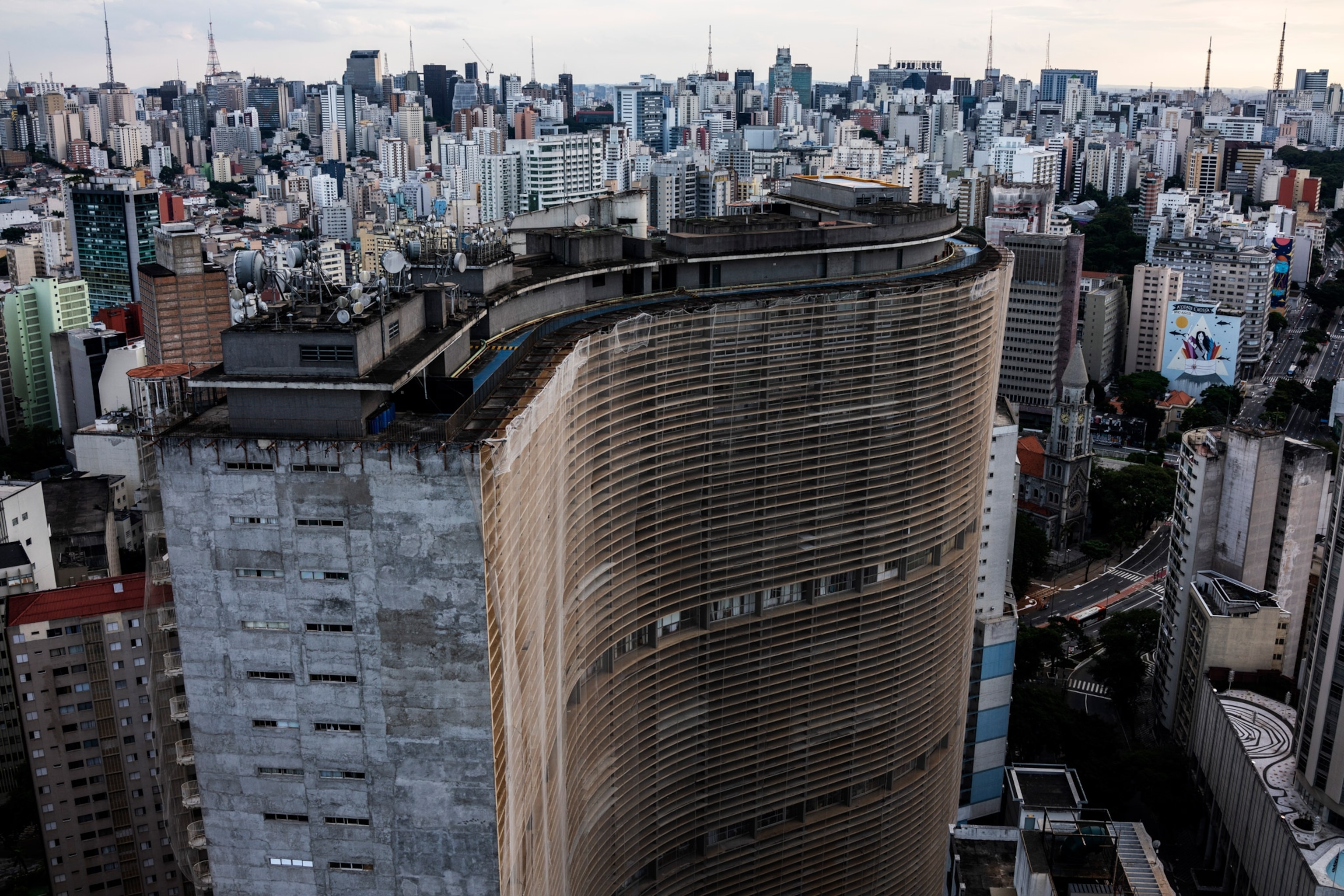 an aerial view of sinuous building