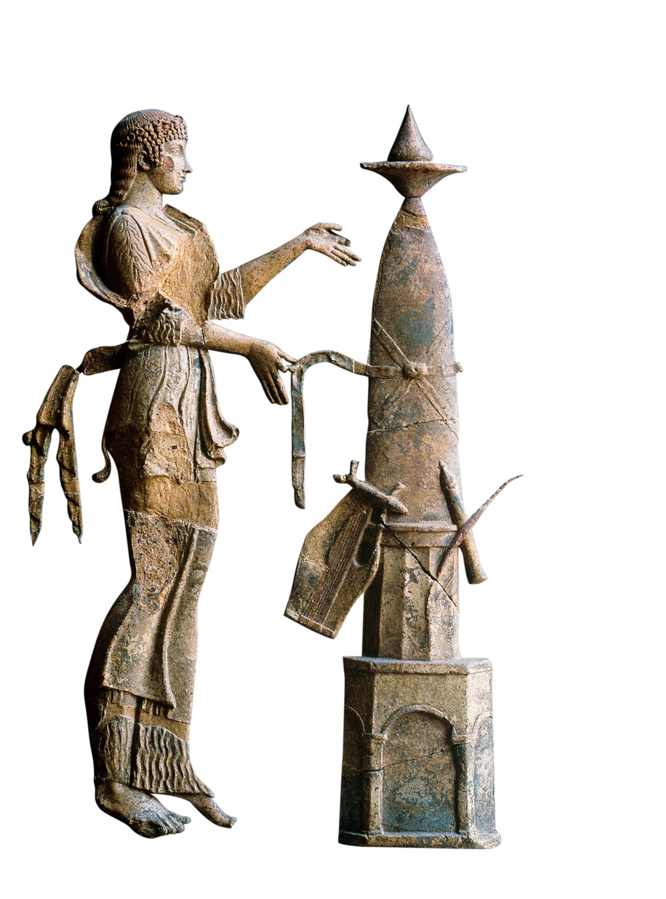 A statue of a man next to a pillar