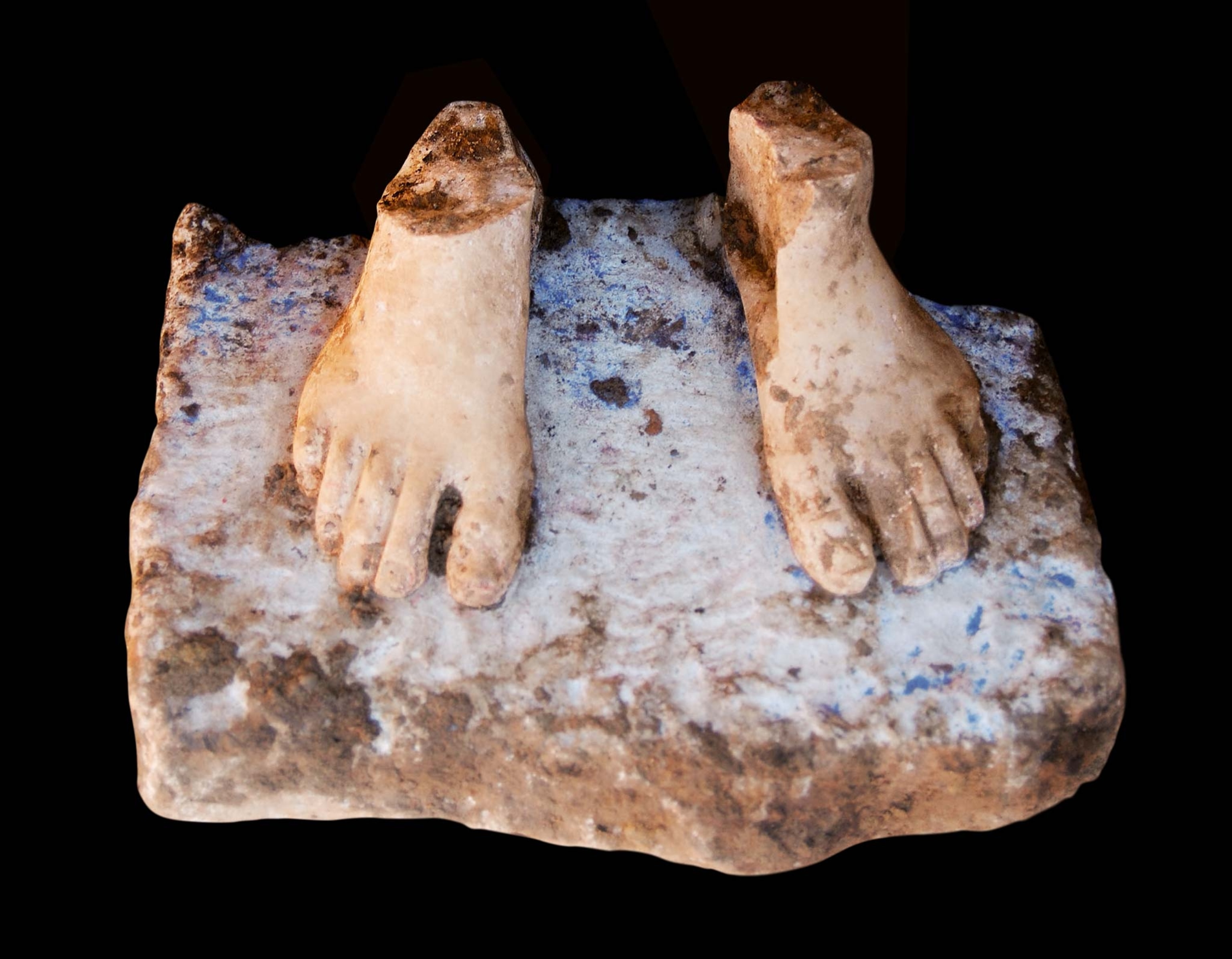 The feet of a Greek statue