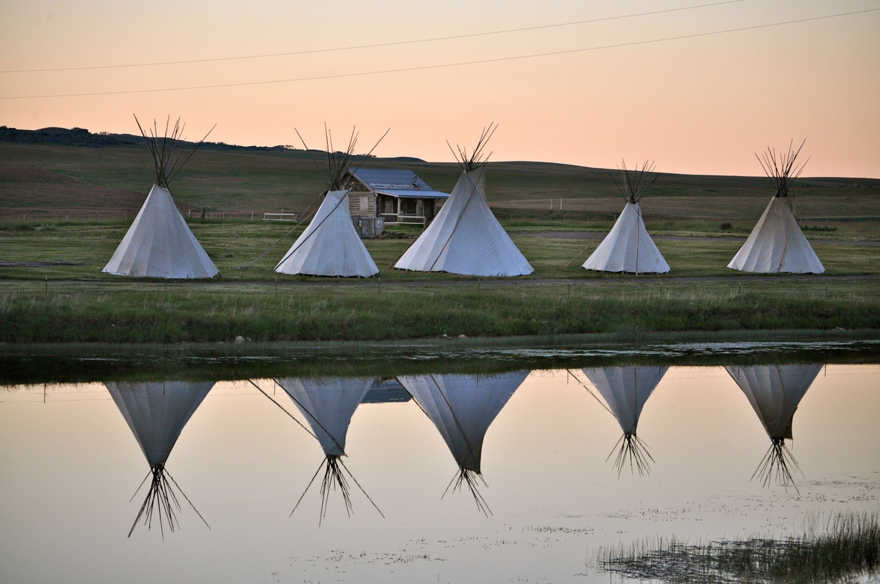 Five lodges on the Blackfeet tribal camp ground network seen along highway two on the full day tour route in East Glacier Park.