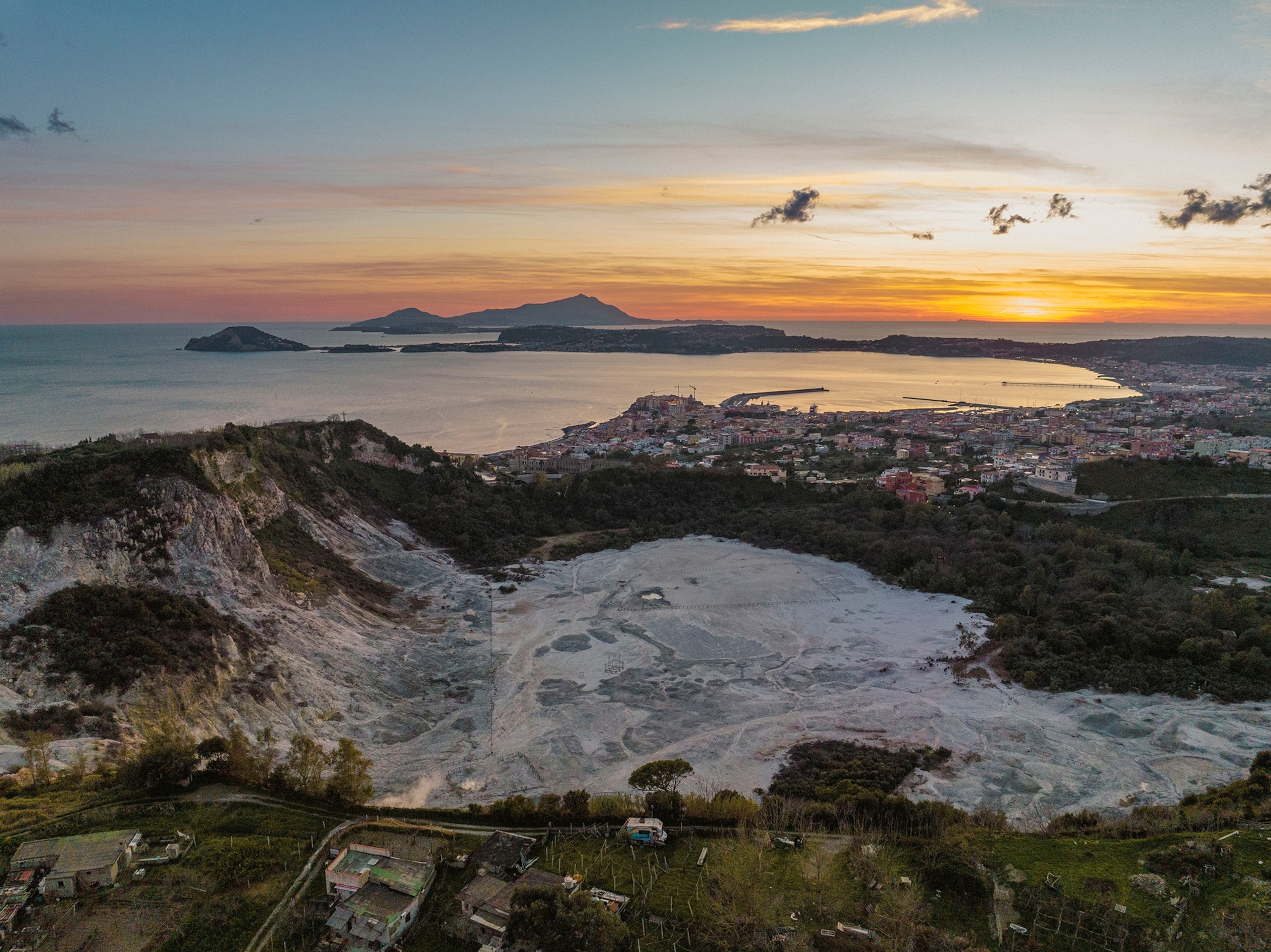 Aerial view of the town of Pozzuoli with the Solfatara volcano in the foreground.