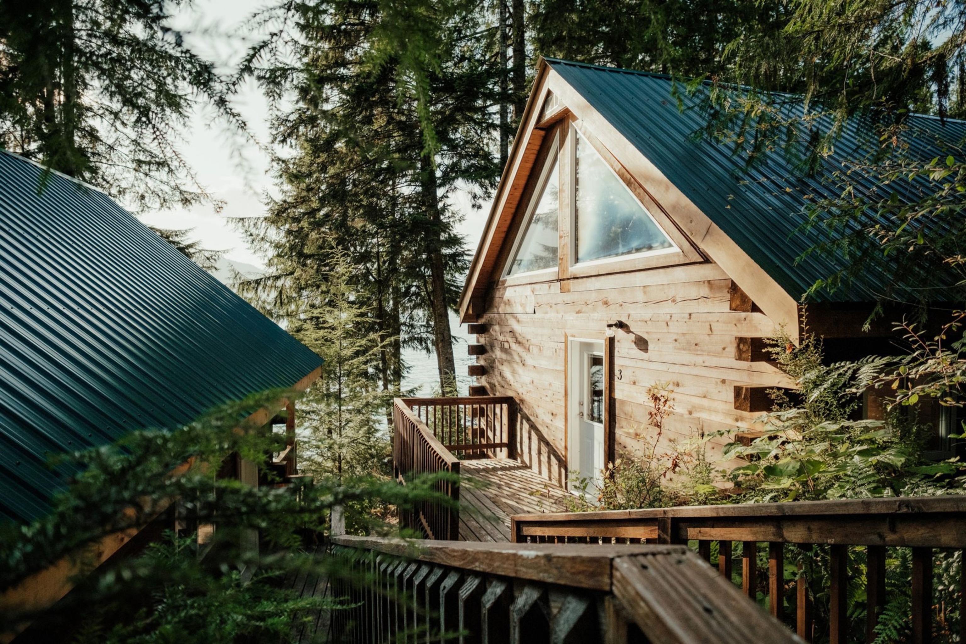 Oceanfront cedar timber cabins at Klahoose Wilderness Resort, Klahoose First Nation Territory