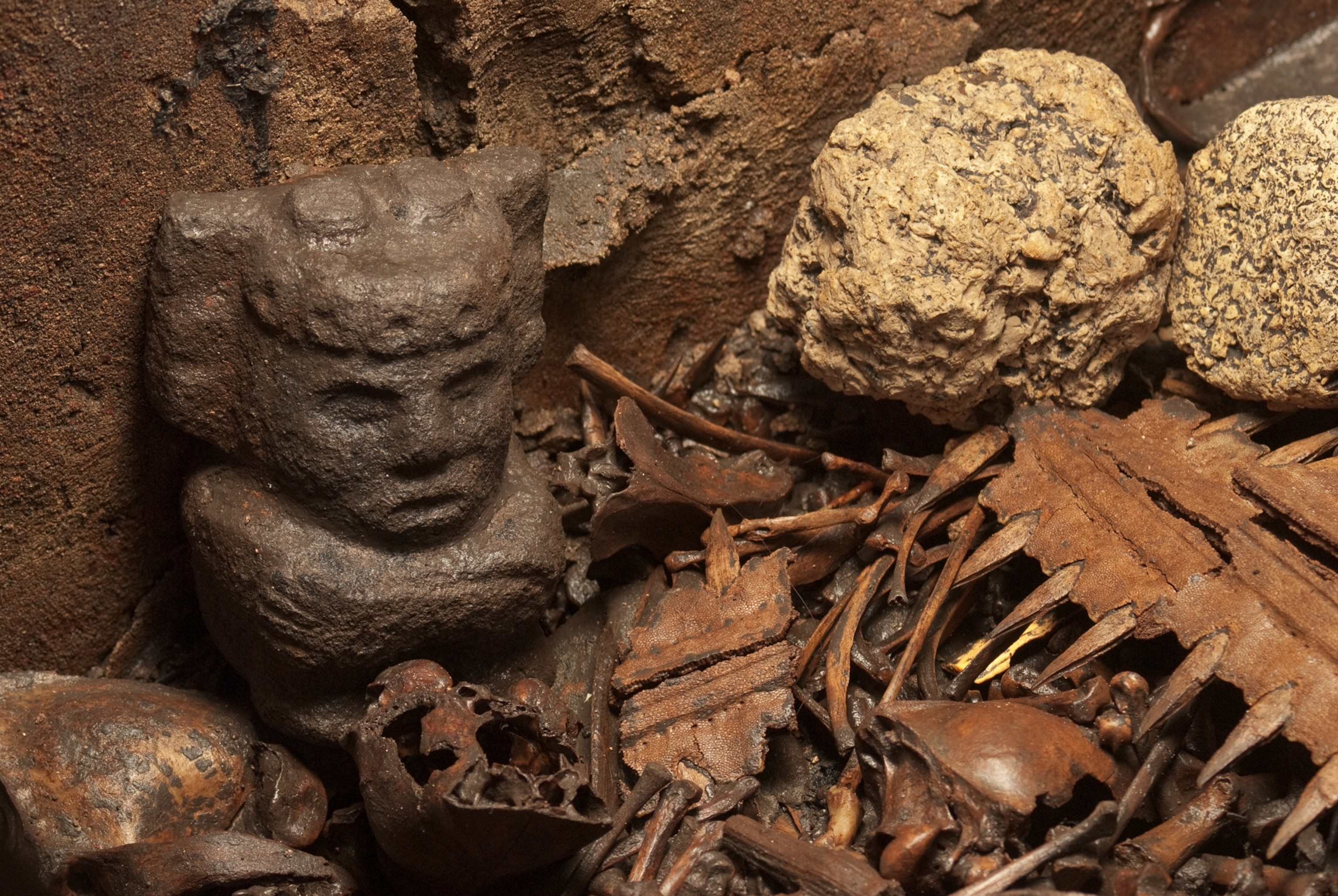 a stone image of fire god Xiuhtecuhtli found in offering box 126