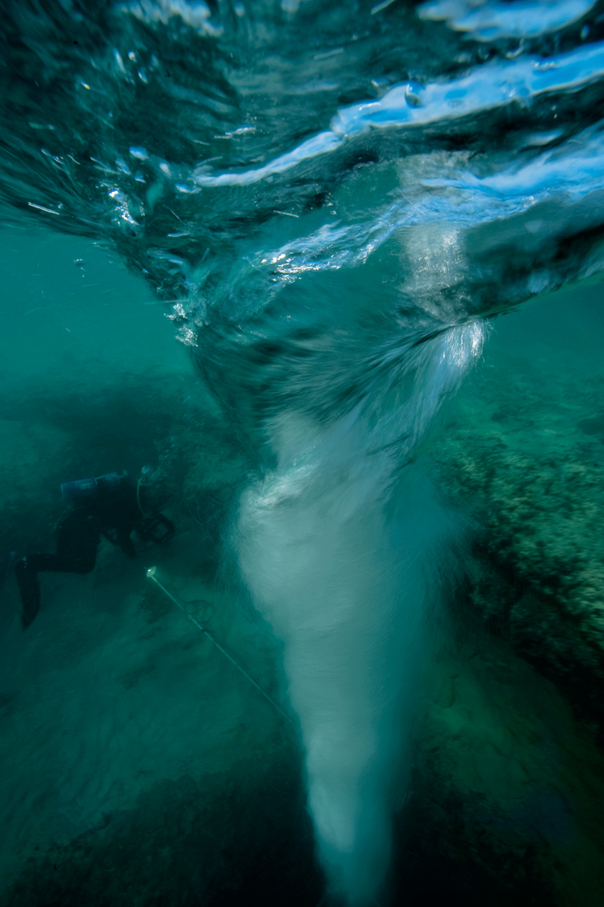 whirlpool vortex in the Chimney Blue Hole