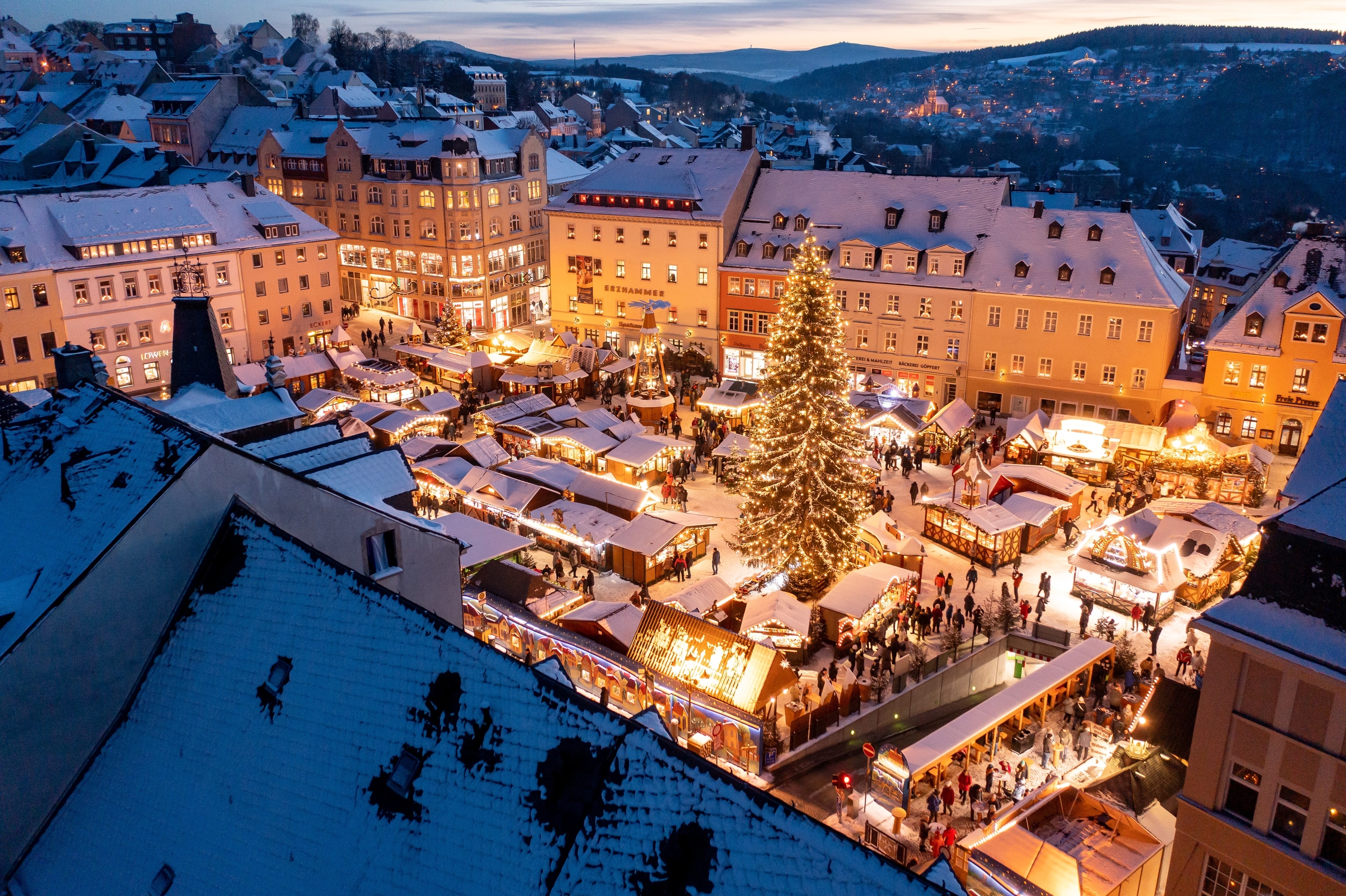 Annaberg-Buchholz's Christmas market lights up the snowy city center.