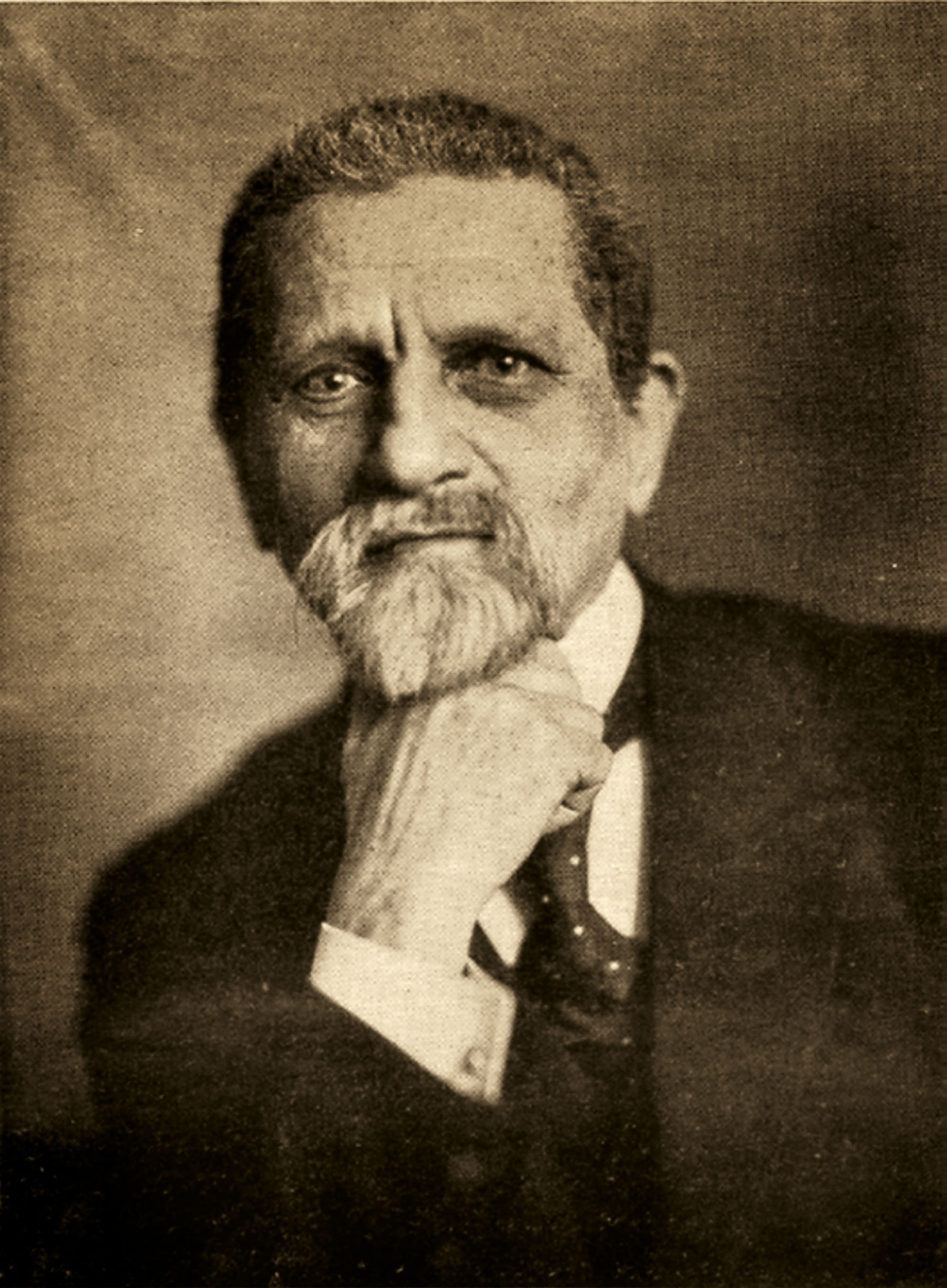 A black and white portrait of a man