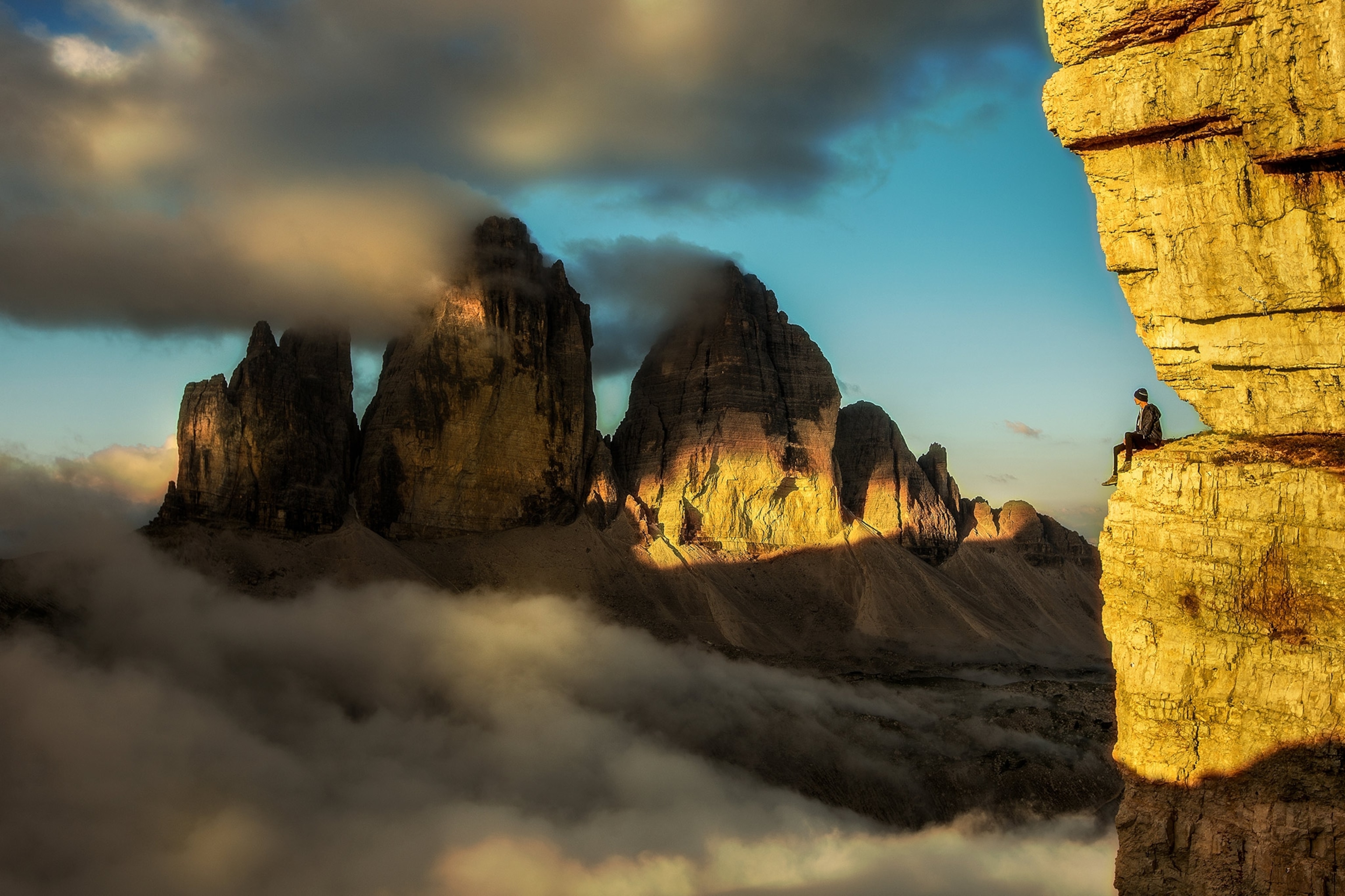 a hiker resting near Tre Cime di Lavaredo, Italy