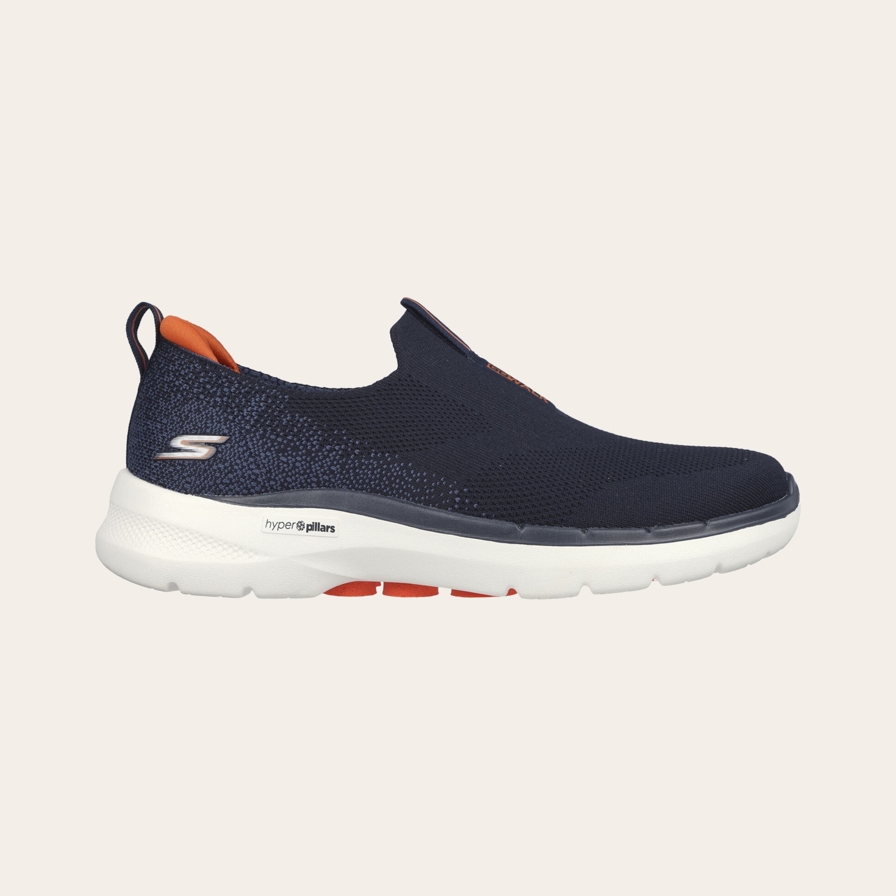 An image of black slip-on sneakers.