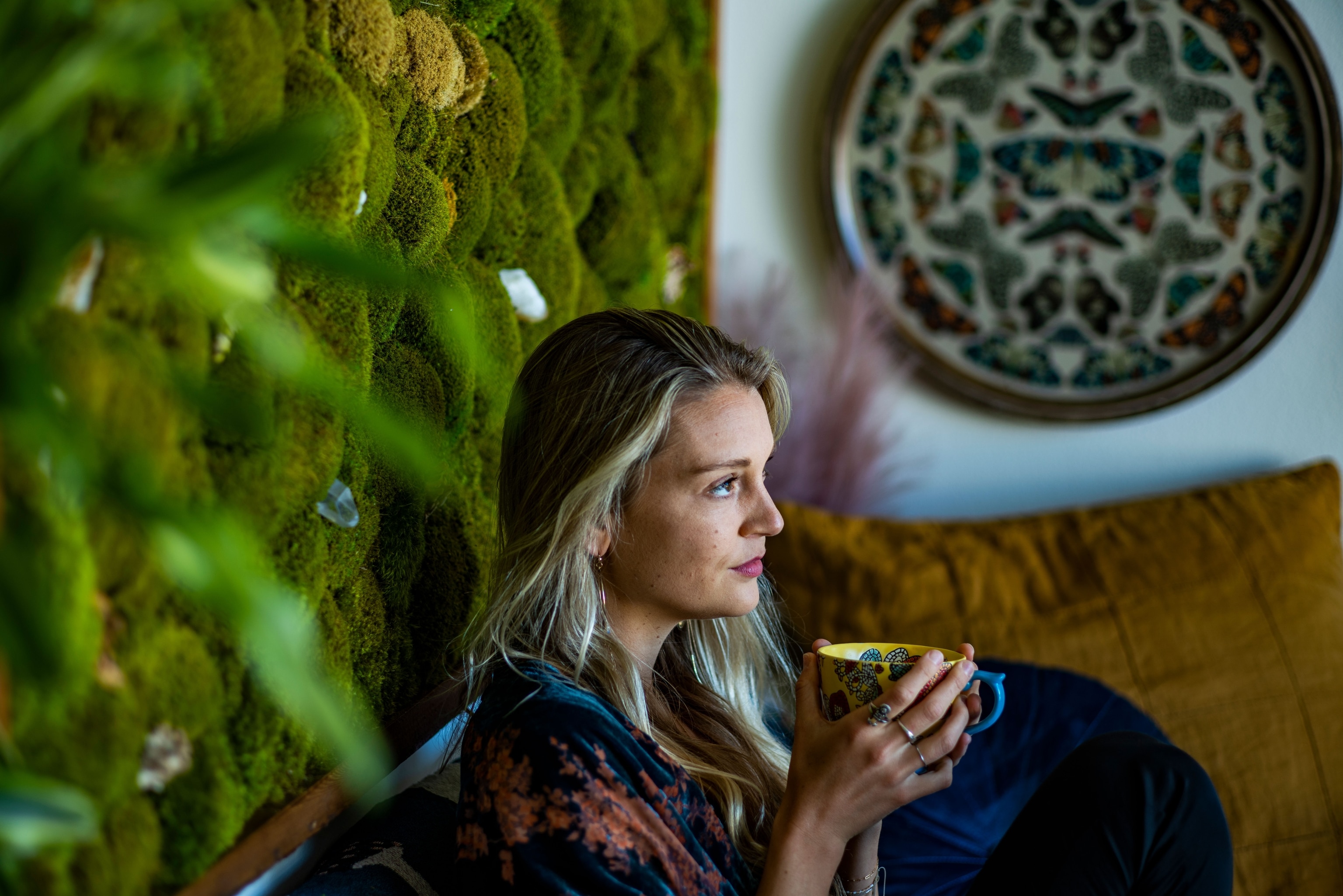 A woman relaxes in her L.A. apartment after taking a microdose of Psilocybin.