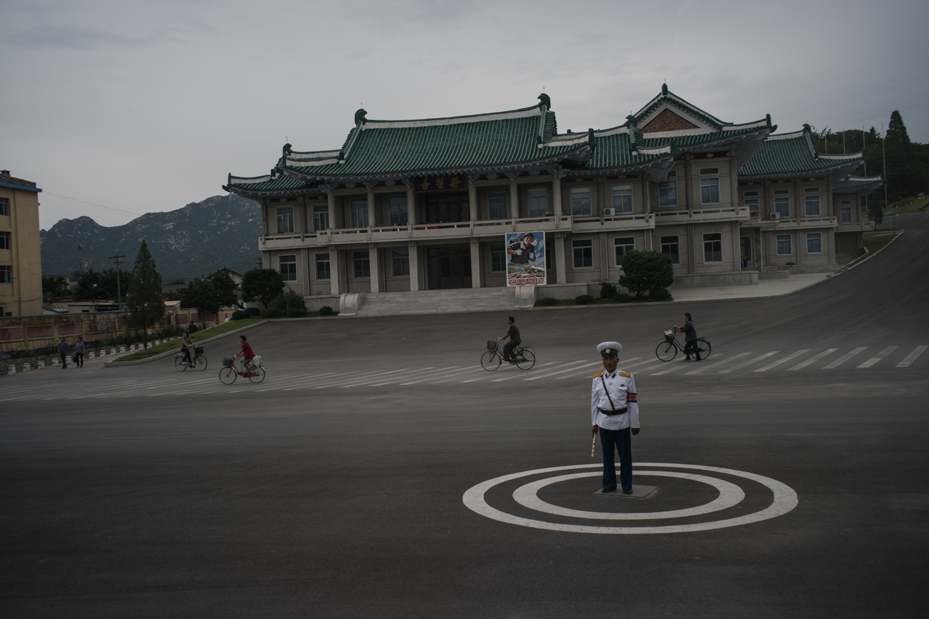 a A traffic policeman in Kaesong, North Korea.