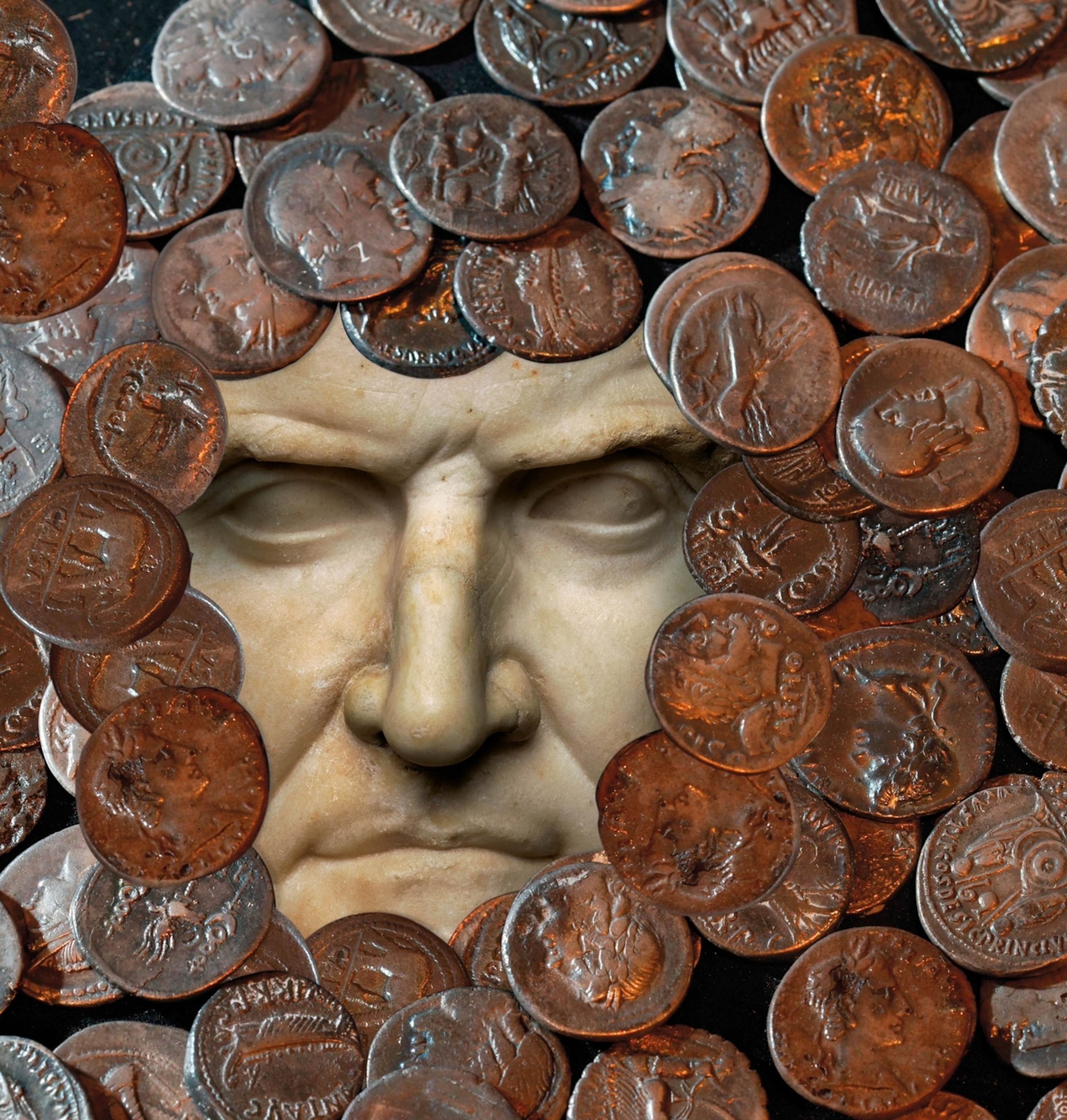 Roman coins enveloping a bust of Crassus