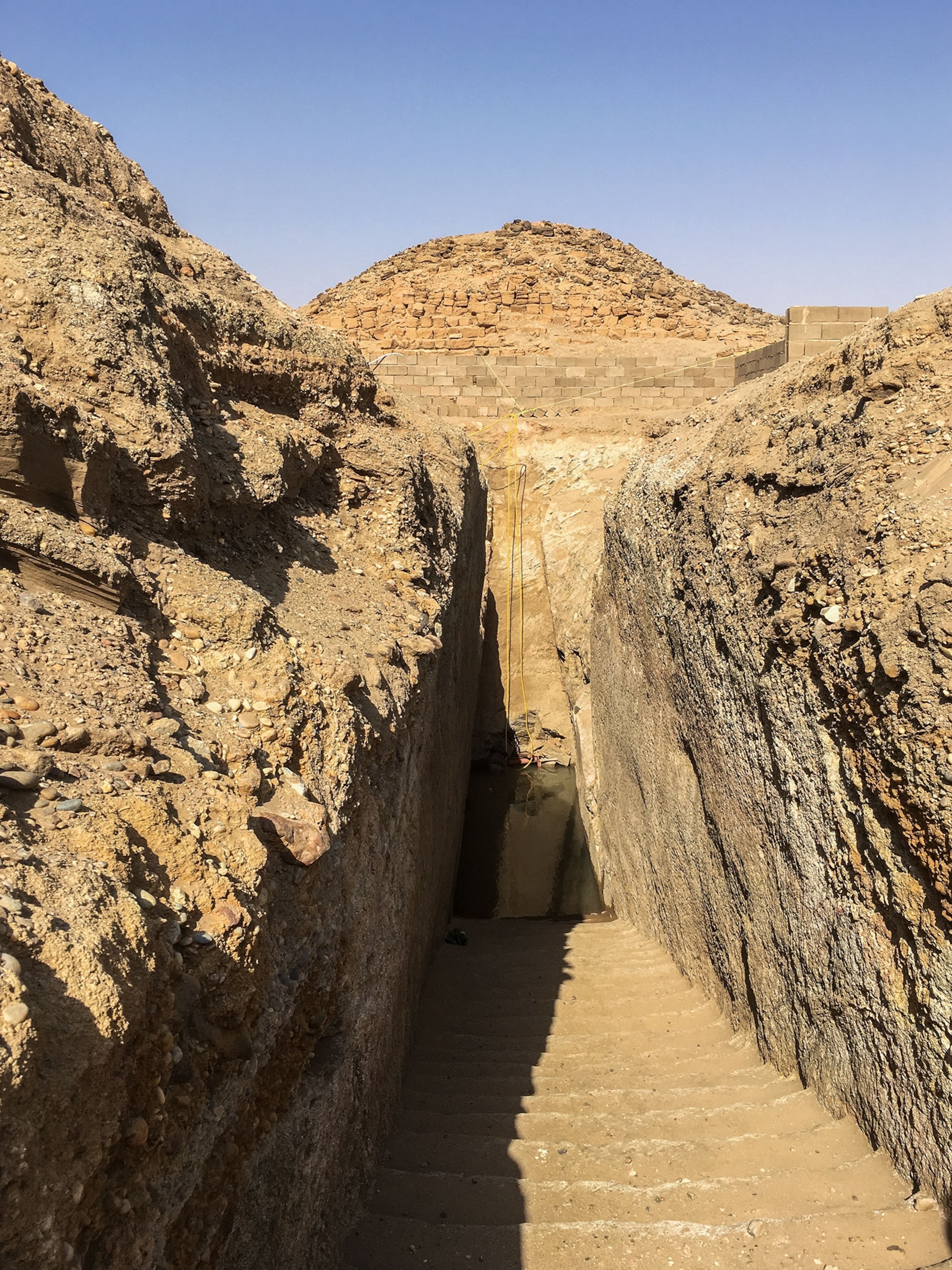 a staircase leading into the tomb of a pyramid