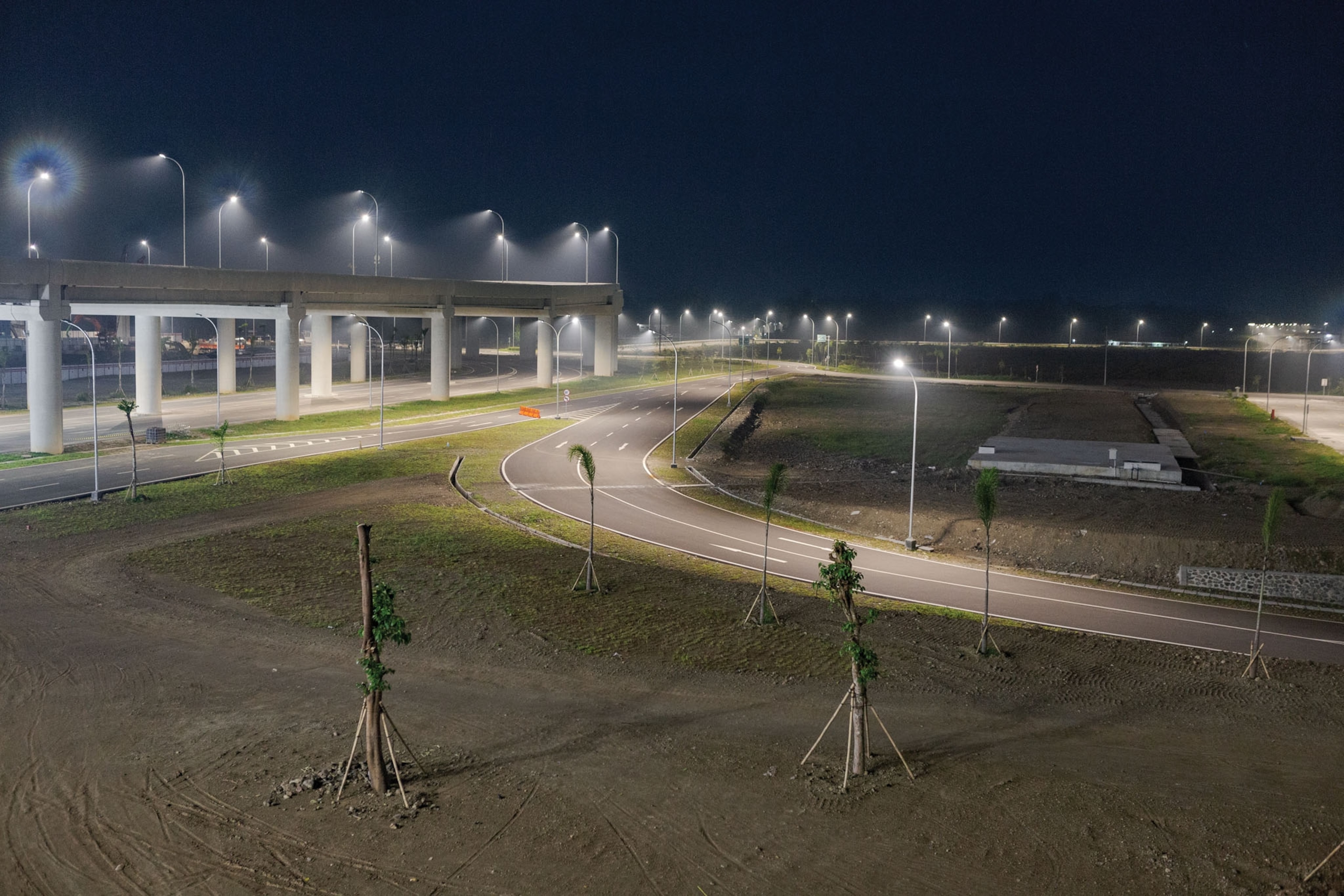 empty runways of airport at night.