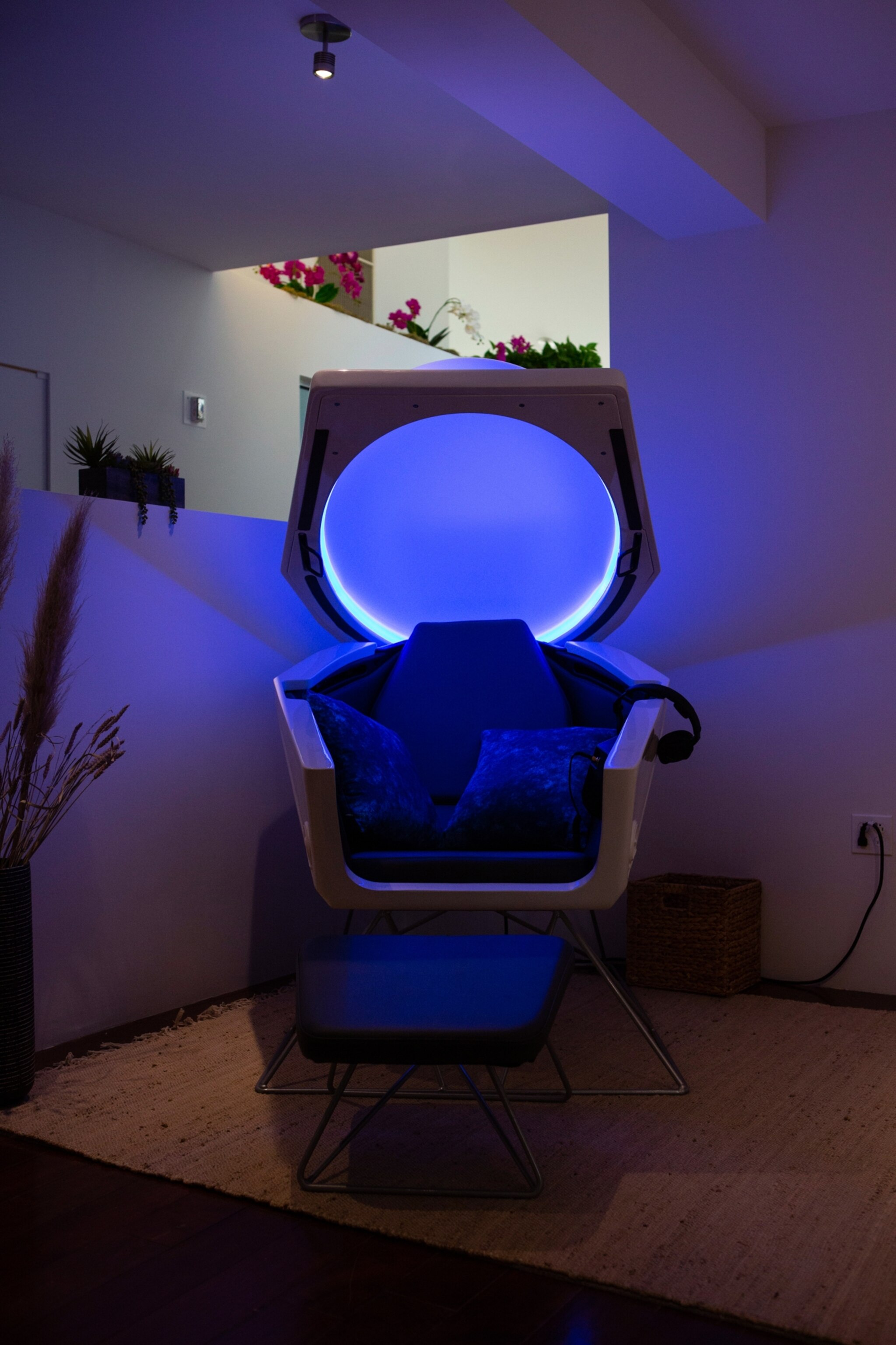 A meditation chair at a Field Trip clinic in New York is fitted with a dome-shaped top that emits a blue light.