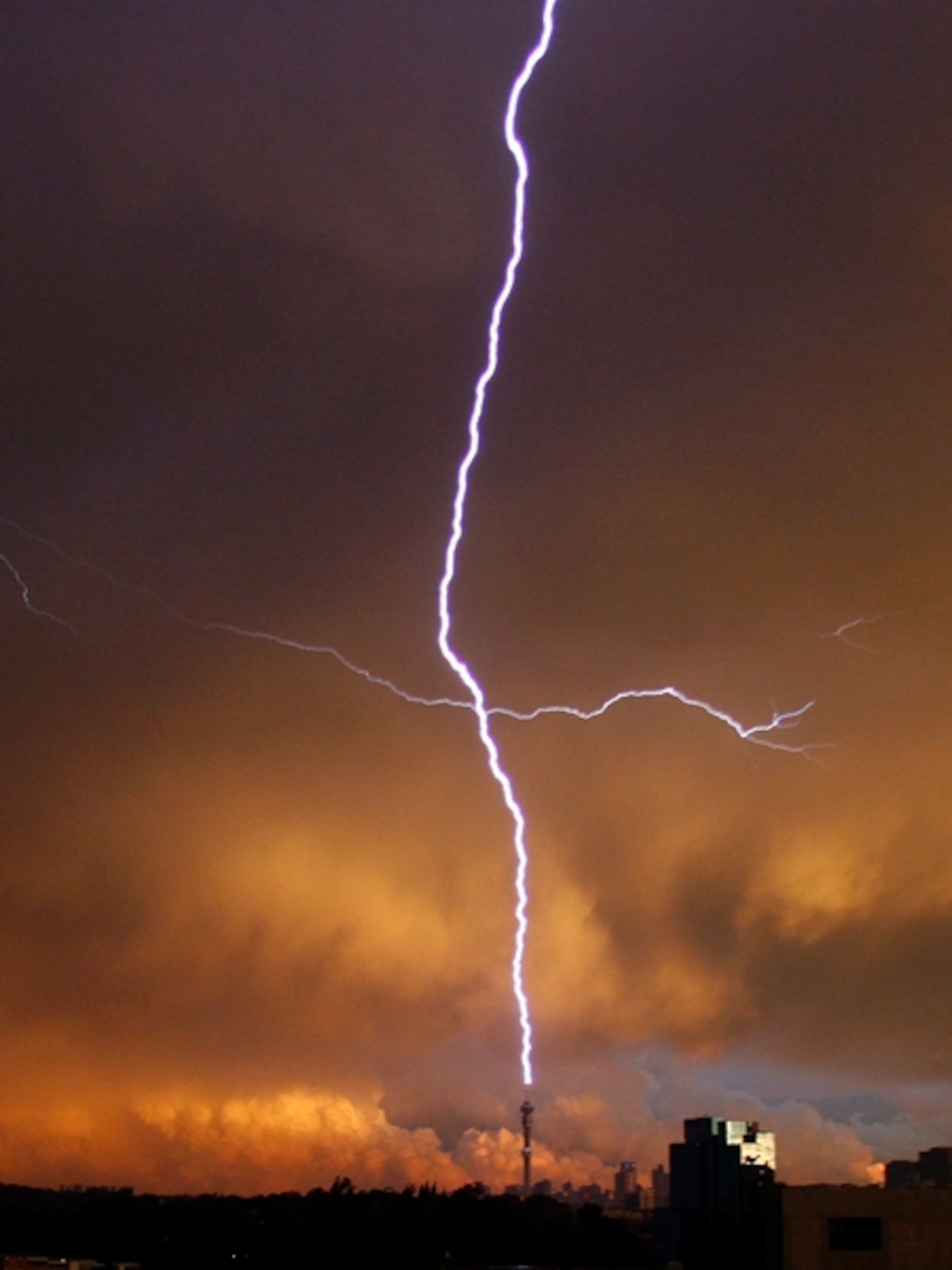 Lightning striking a tower
