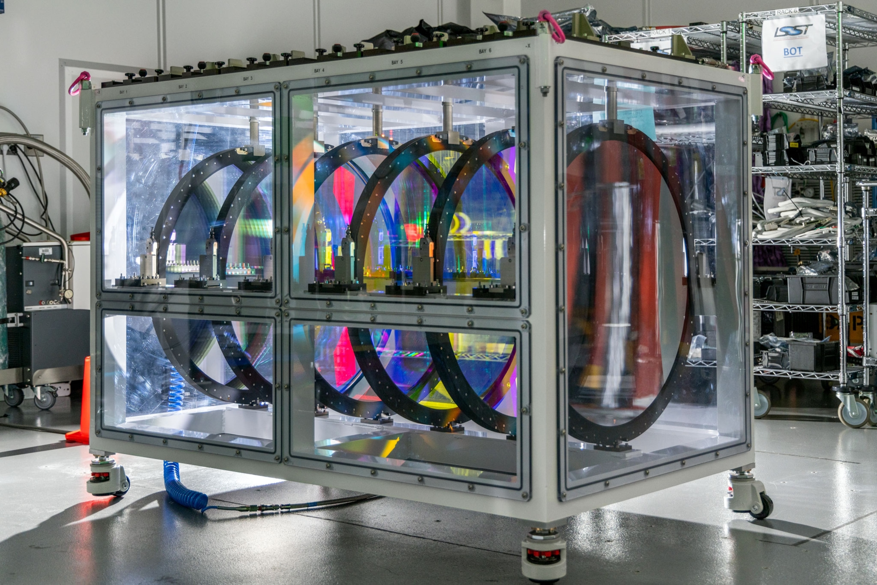A large box with glass walls holds the colorful filters for the camera.