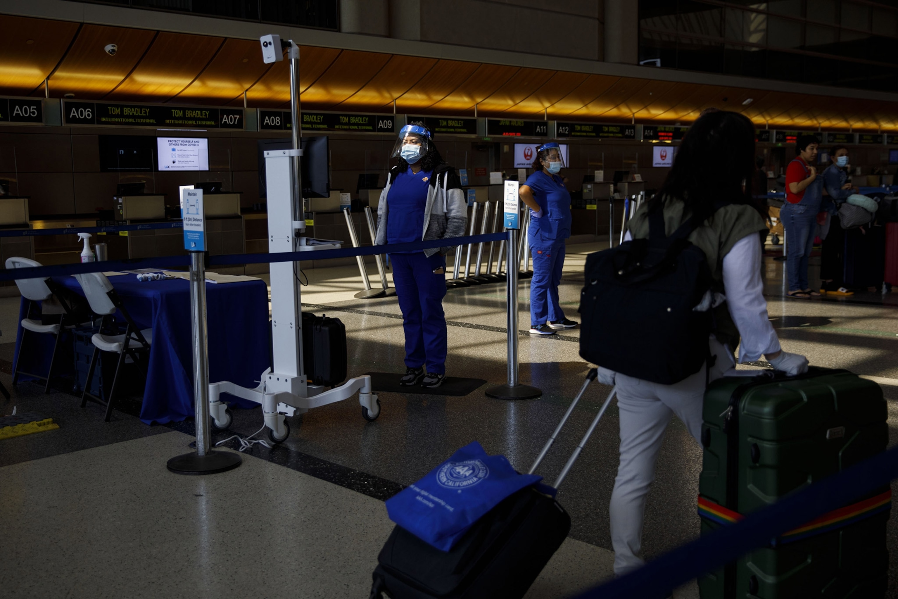 a medical assistant watching a monitor at Los Angeles International Airport