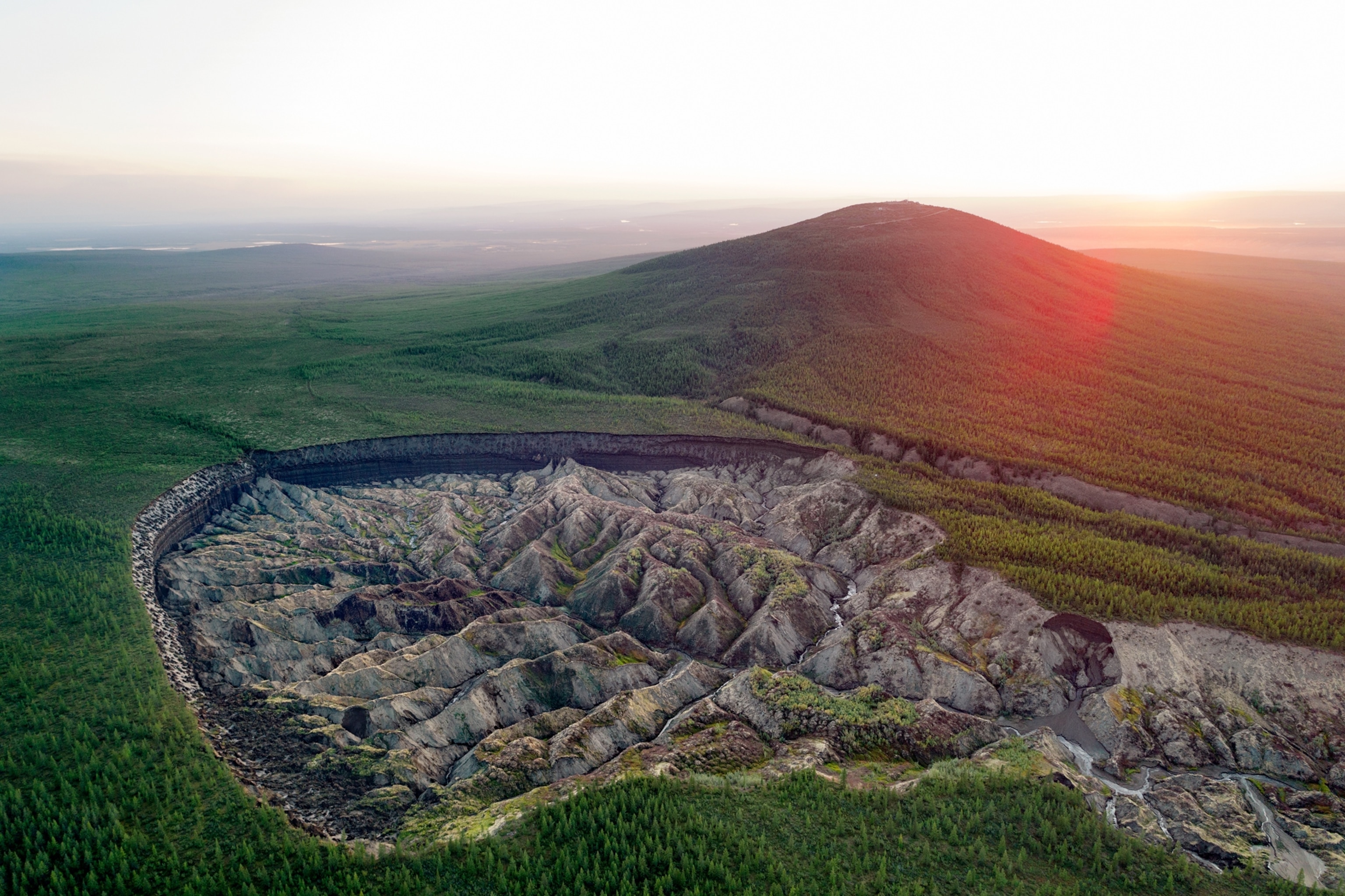 aerial view of depression in landscape.