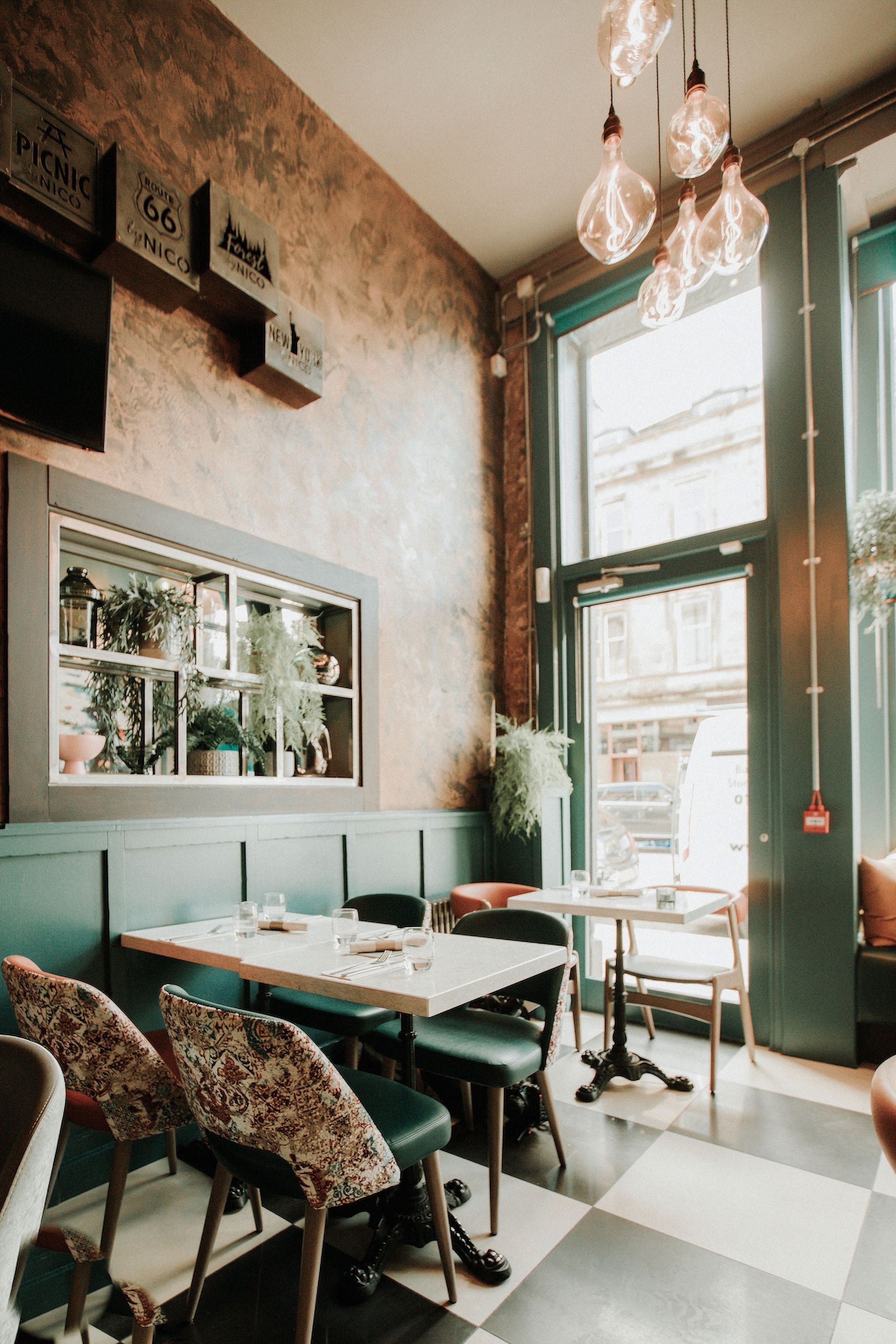 interior of restaurant with blue and floral prints