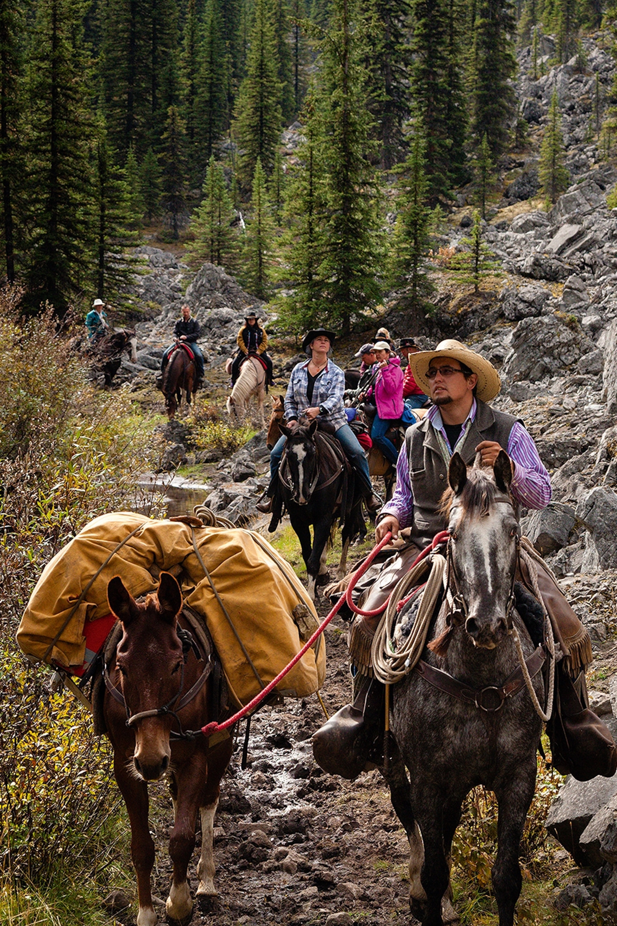 People horse-riding in Banff National Park.