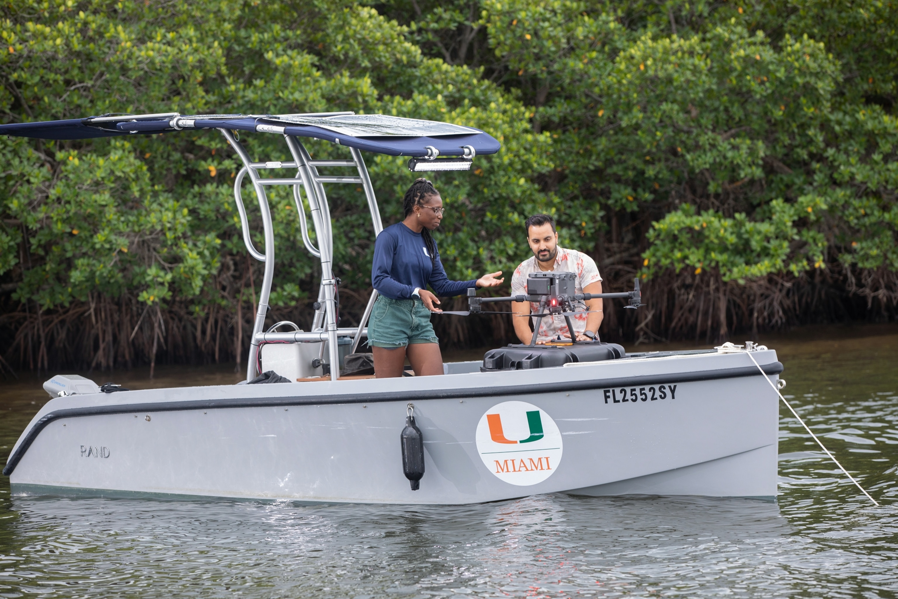 Picture of man and woman in the boat.