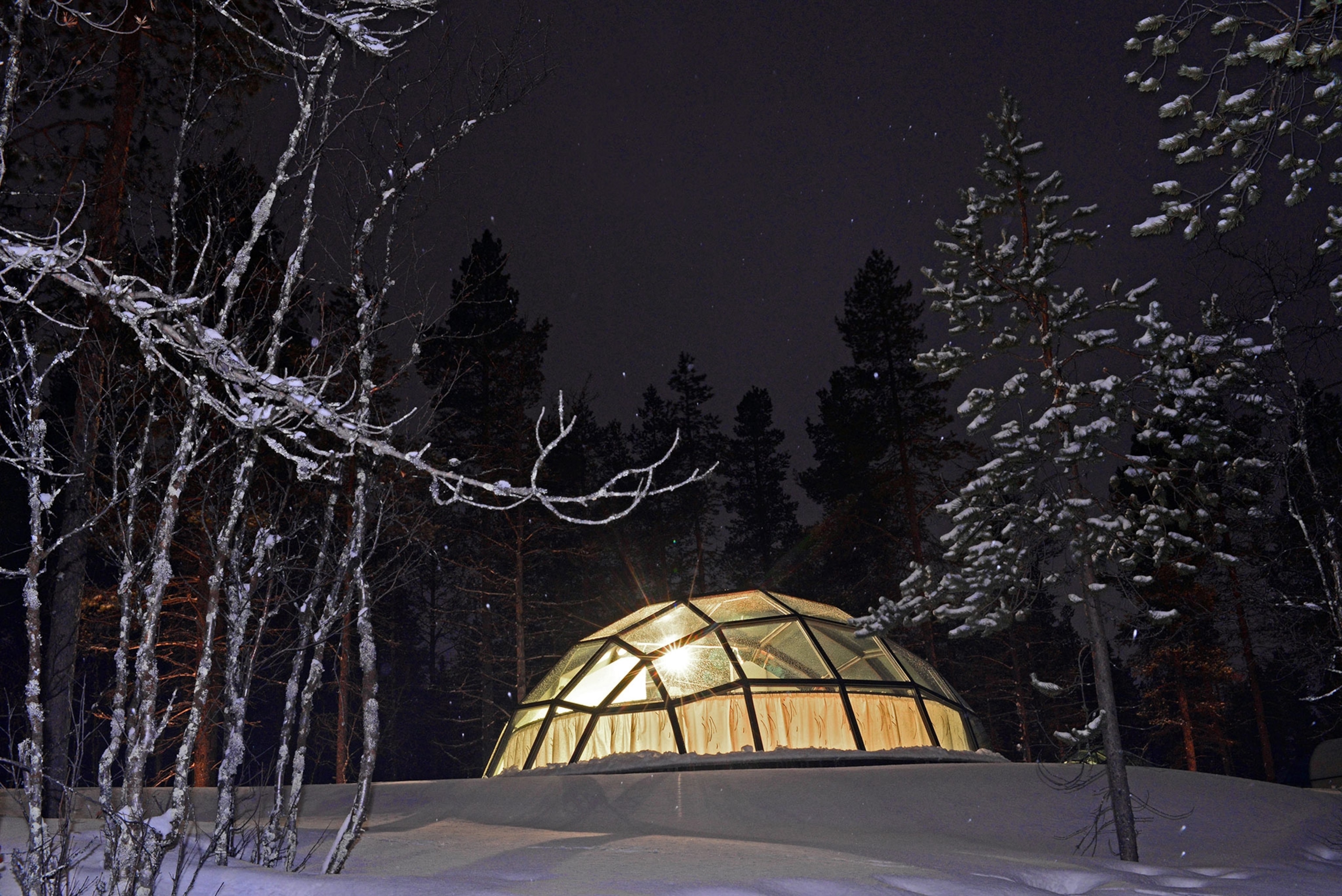 glass igloos reflecting light