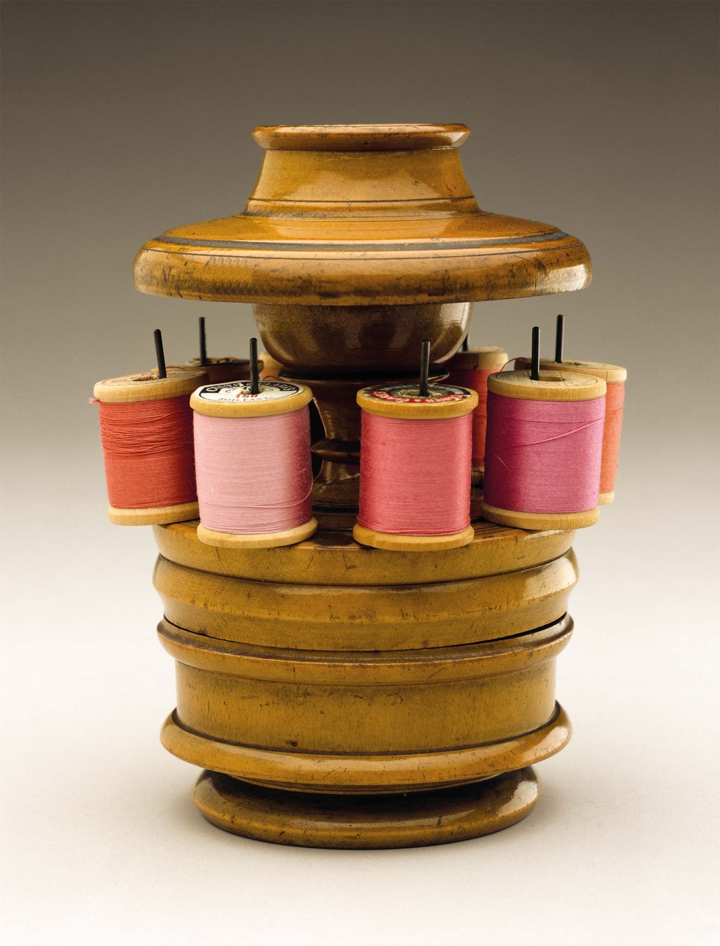 A 19th-century maple thread caddy