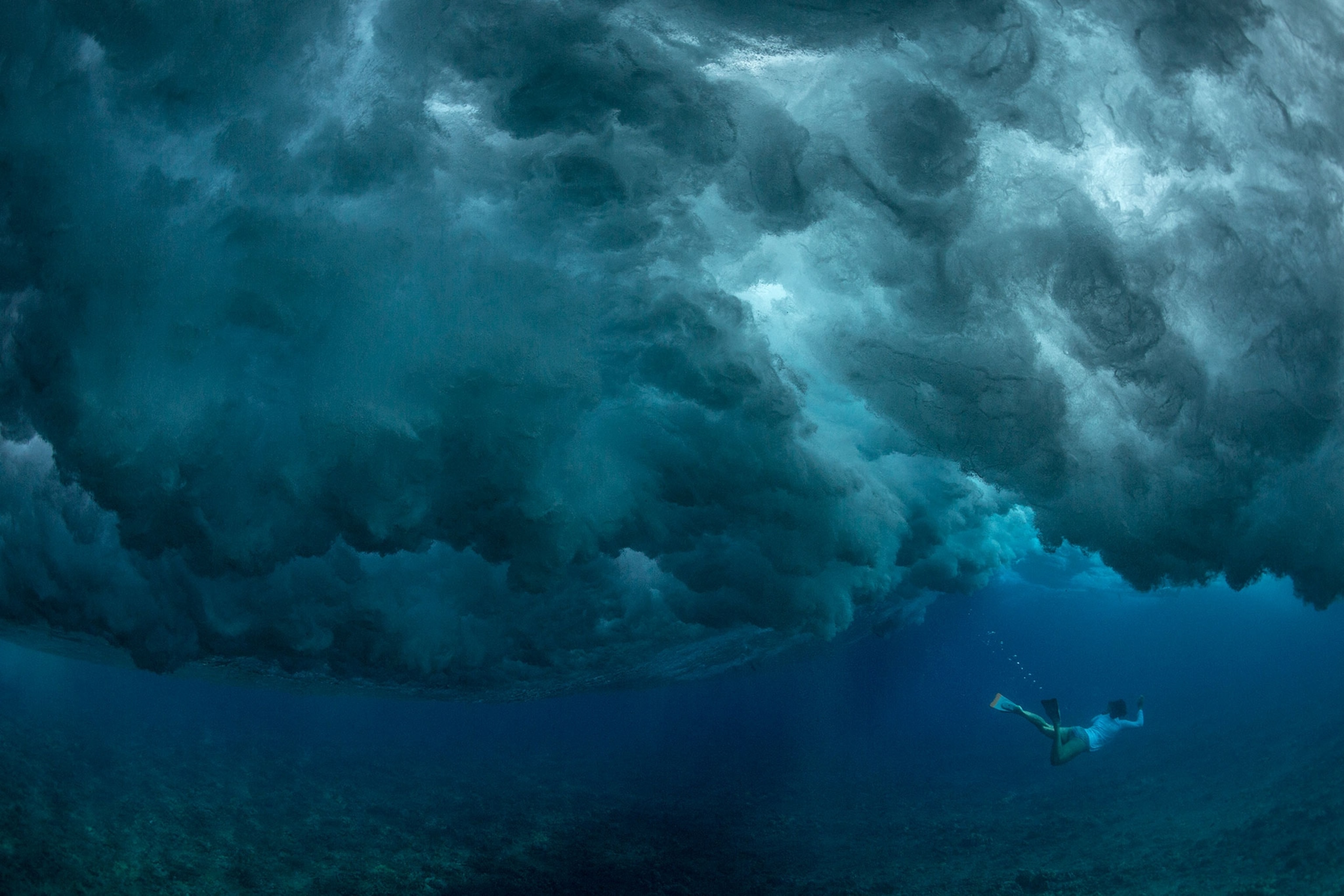 a swimmer under a crushing pipeline
