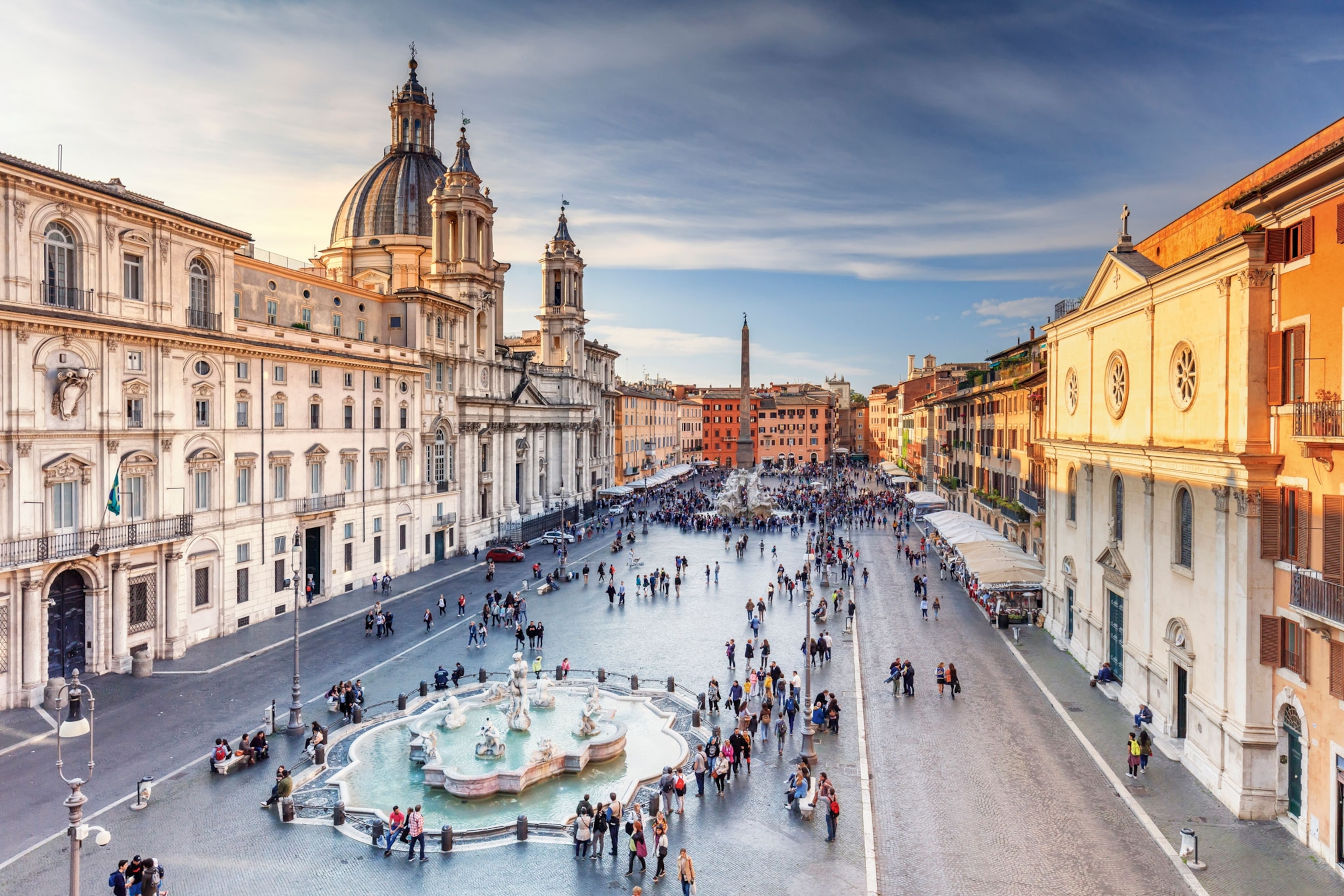 An elevated view of a city square surrounded by historical buildings