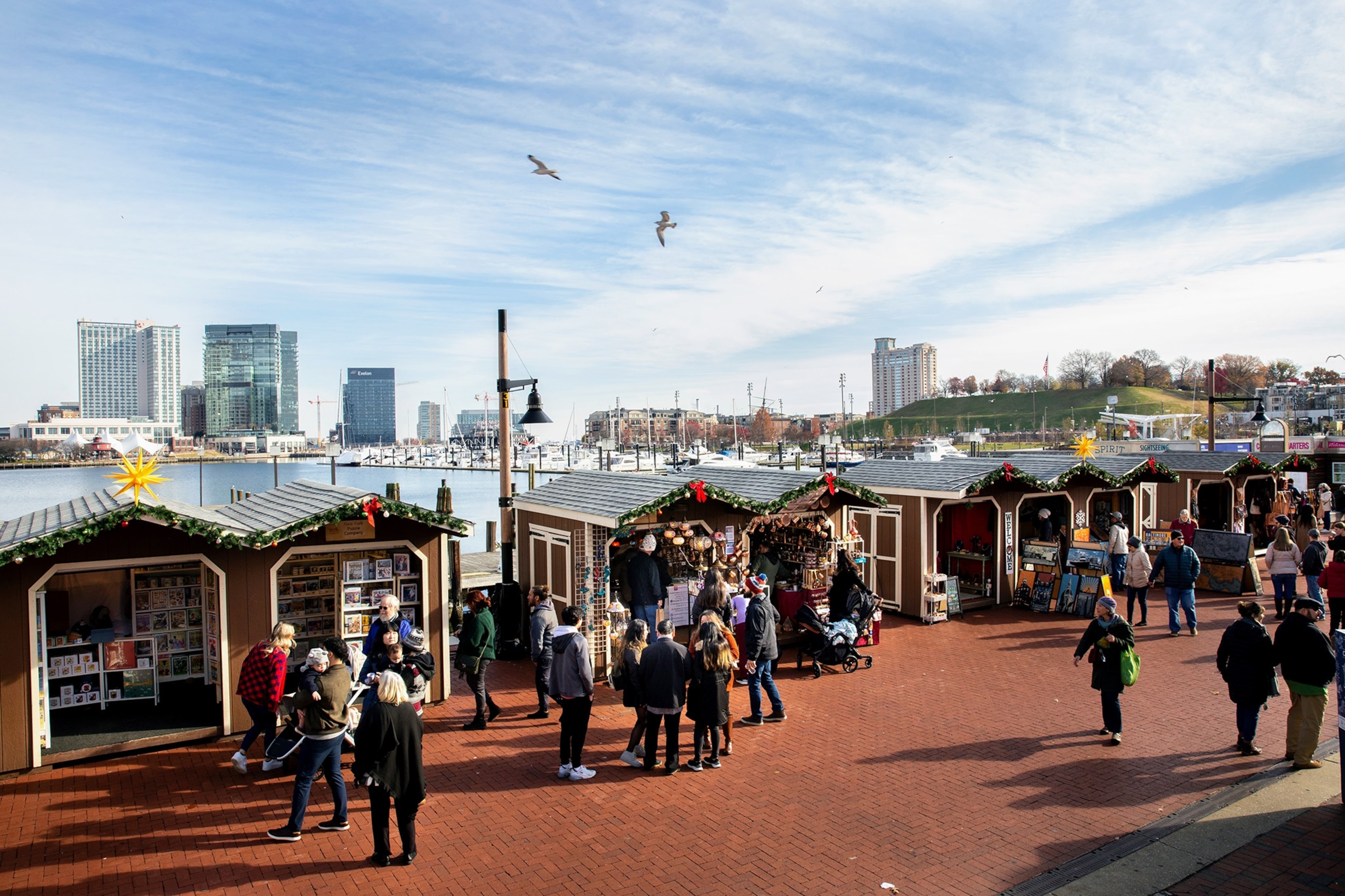 Small shops line the waterfront at the Baltimore Christmas Market.