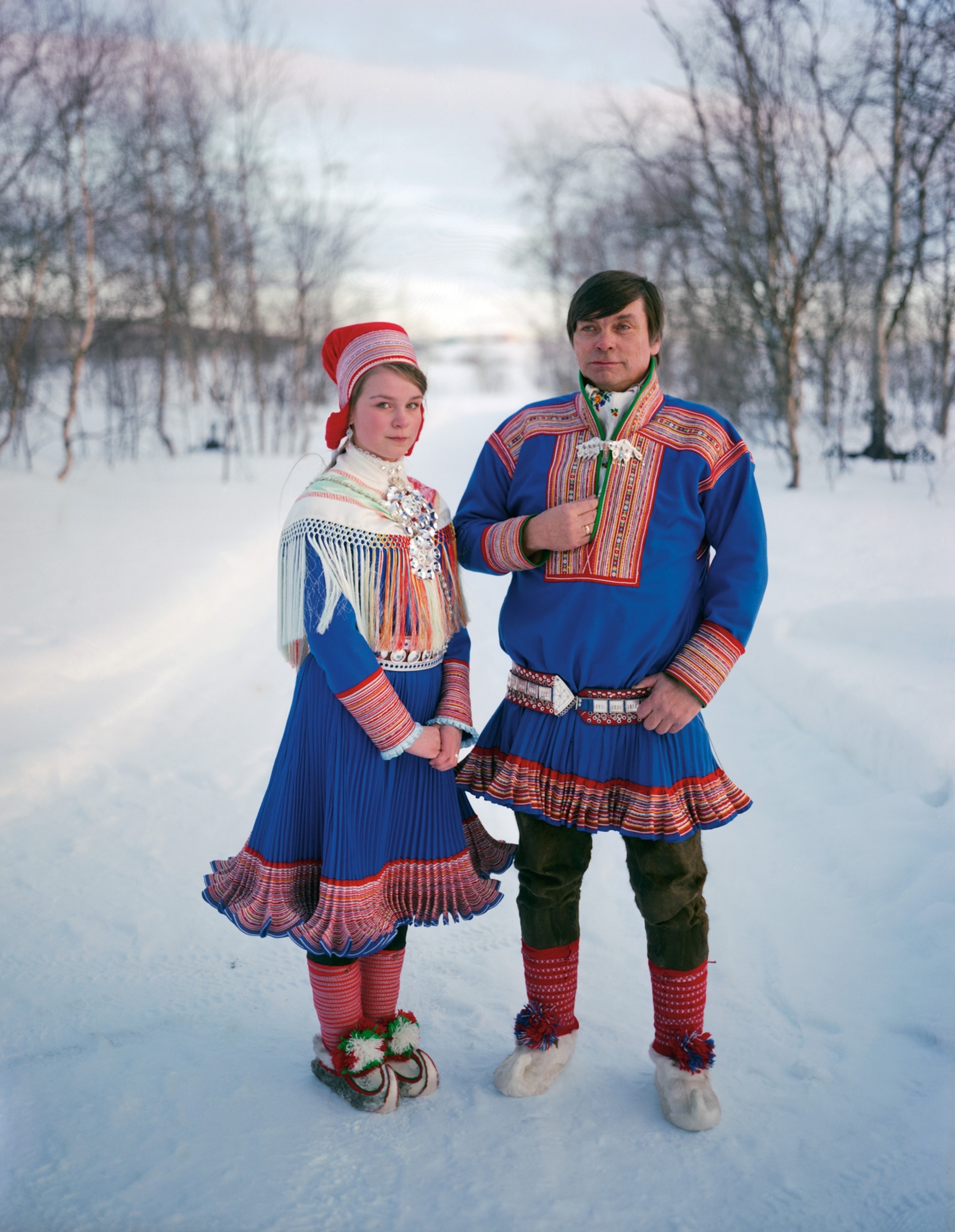 father and daughter dressed for her confirmation in Kautokeino, Norway