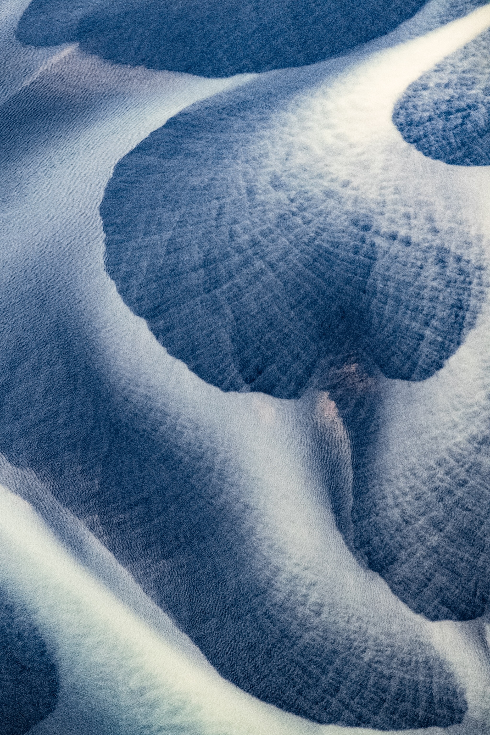 the landscape seen from the window seat of a plane over Southern Iceland
