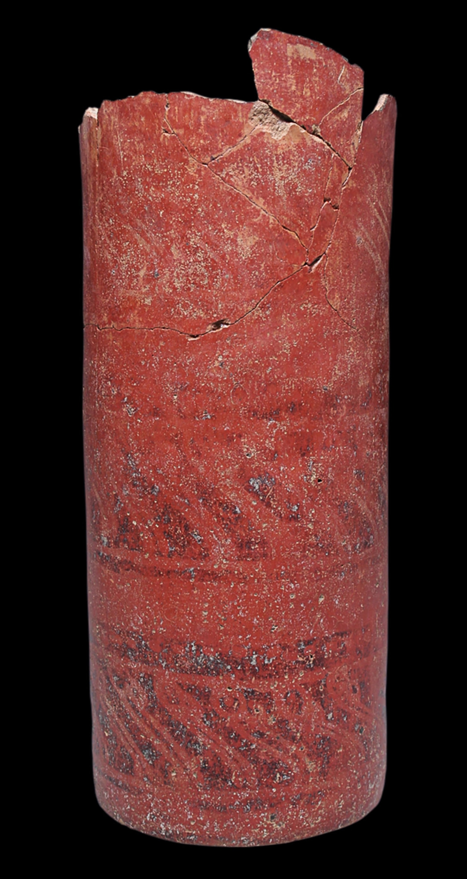 A tall red vase