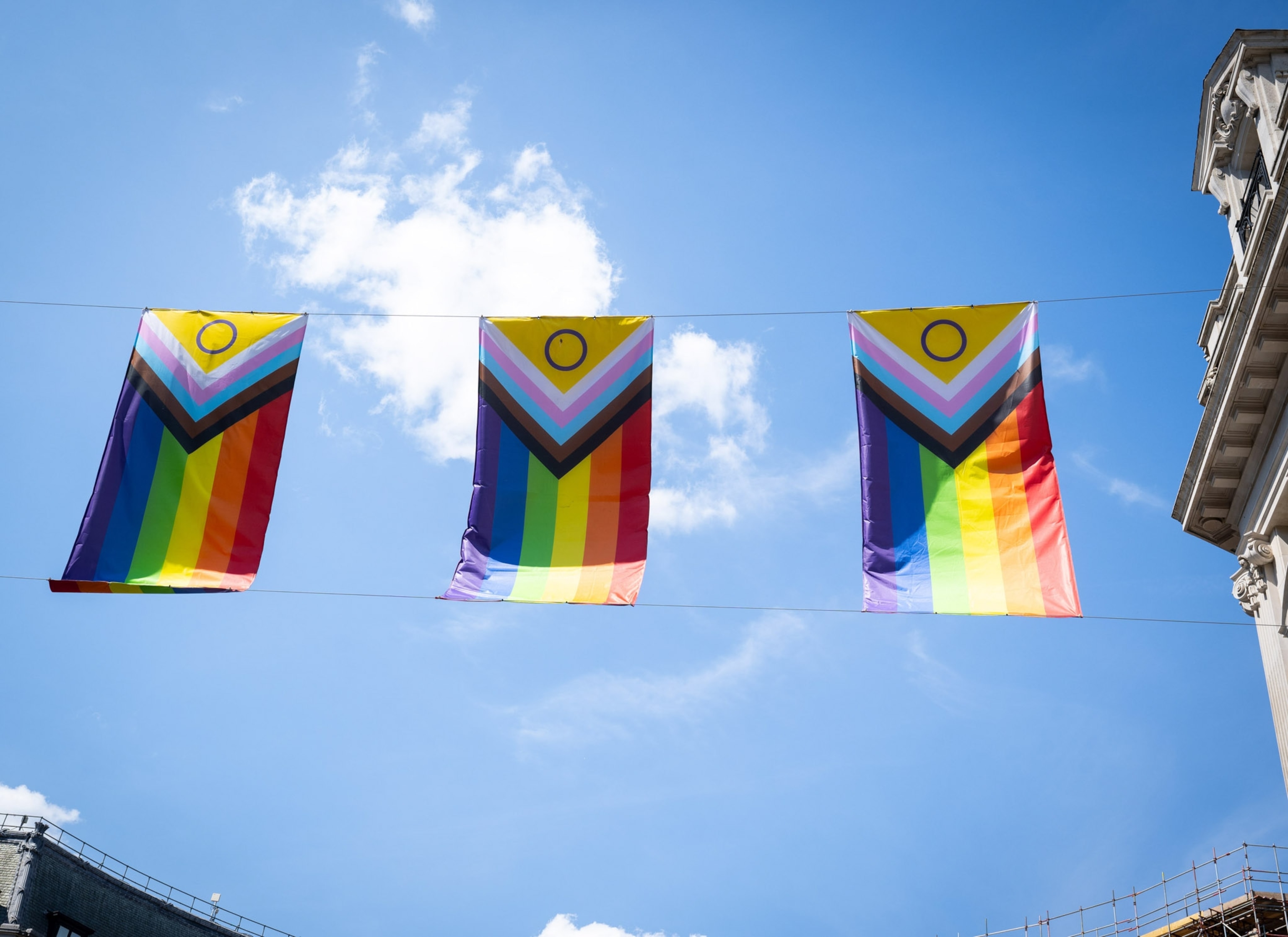 Three flags can be seen above from below.