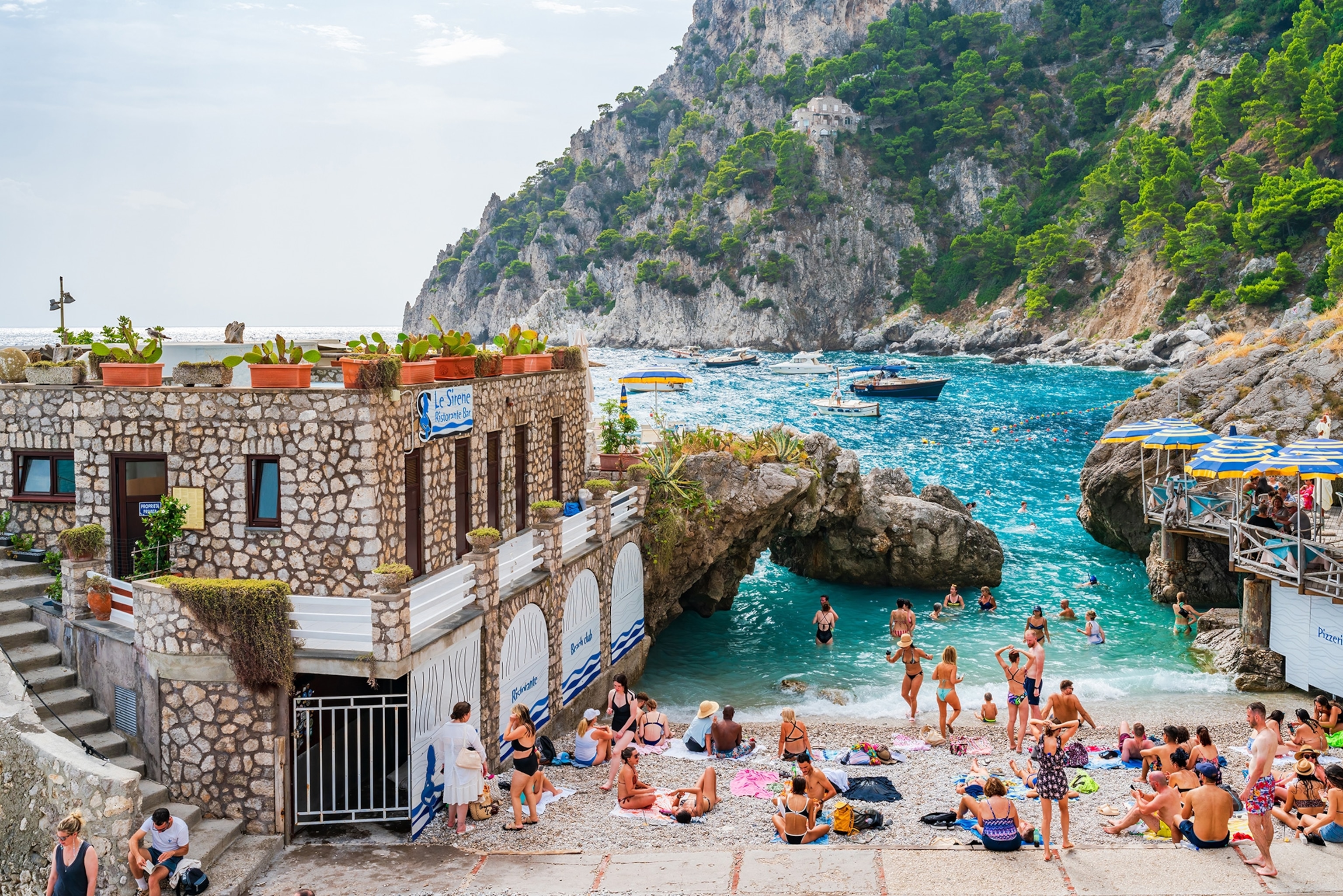 Holidaymakers relax at Marina Piccola on Capri Island.