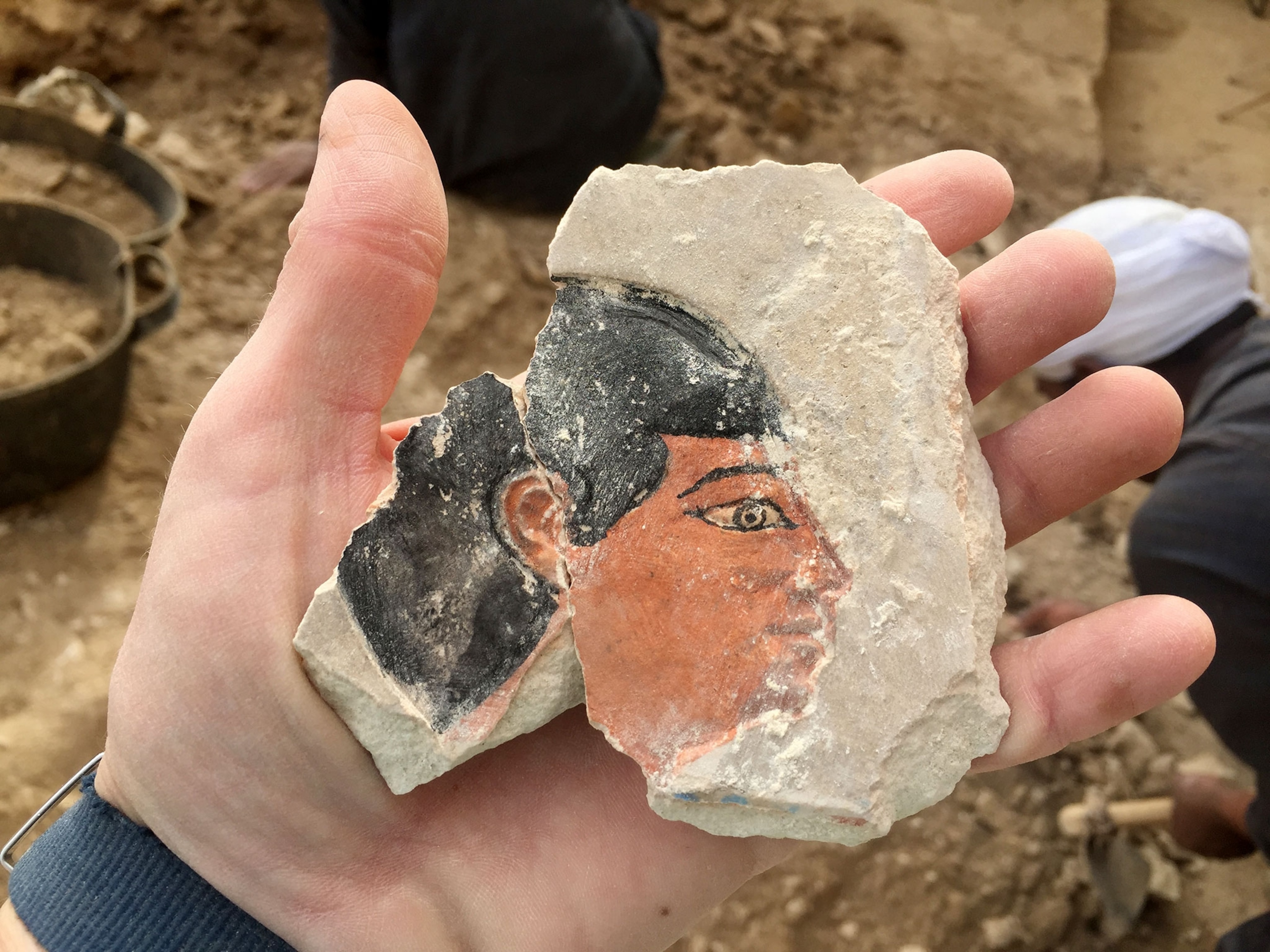 brightly painted face of Intef, discovered in his tomb’s hallway, in December 2017